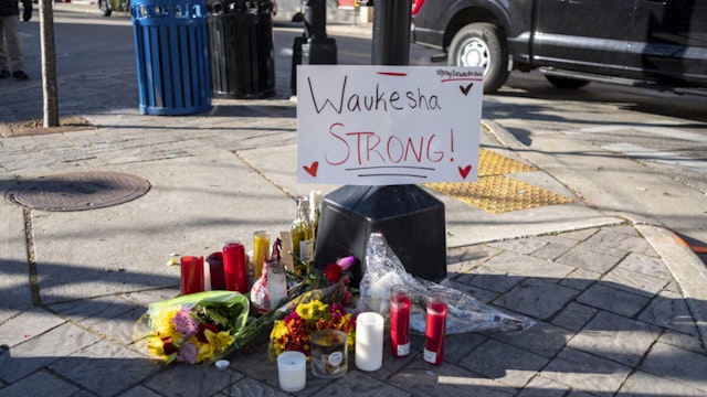 NOVEMBER 23: Memorials placed along Main Street in downtown Waukesha Wisconsin left in areas where people were hit by a driver plowing into the Christmas parade on Main Street in downtown November 22, 2021 in Waukesha, Wisconsin.