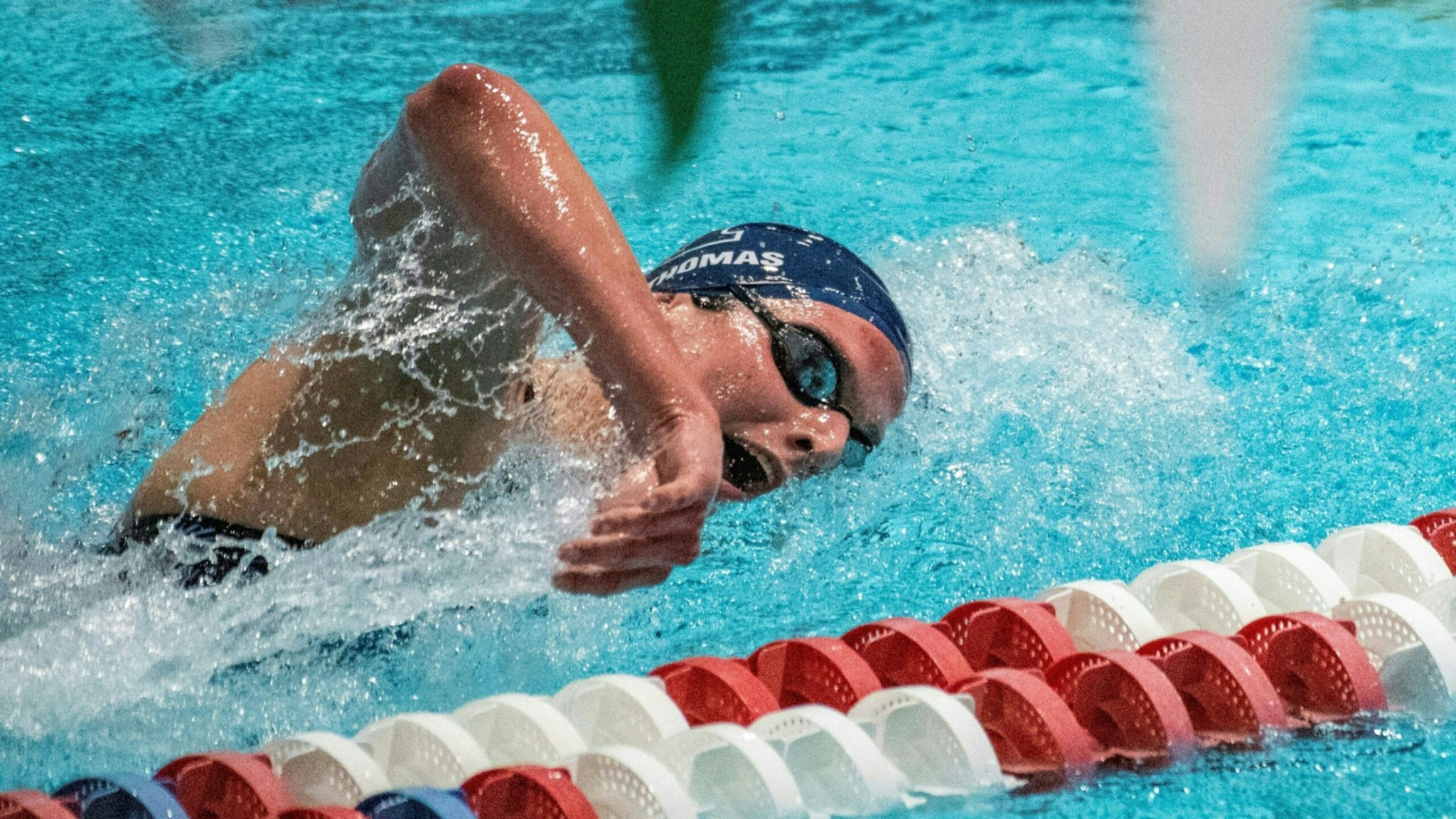 Penn Universitys transgender swimmer Lia Thomas swims in the 500 yard freestyle race, taking first place with 4.41.19, during the preliminary swim races in heat five during the Women's Ivy League Swimming & Diving Championships at Harvard University in Cambridge, Massachusetts on February 17, 2022.