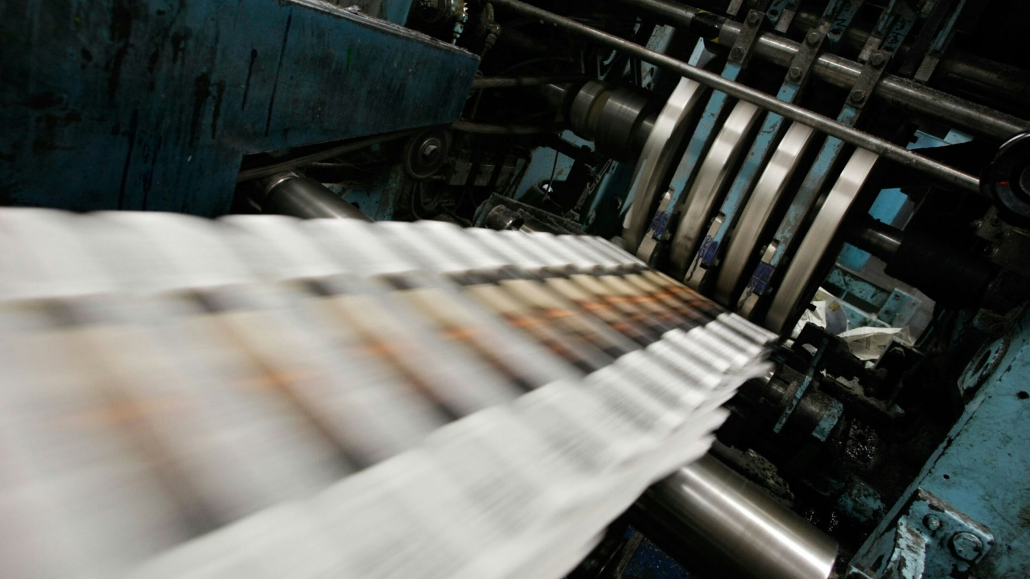 Freshly printed copies of the San Francisco Chronicle roll off the printing press at one of the Chronicle's printing facilities September 20, 2007 in San Francisco, California.