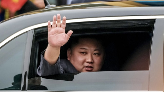 North Korean Leader Kim Jong-un Arrives In Vietnam Ahead Of The U.S.-DPRK Summit LANG SON, VIETNAM - FEBRUARY 26: (EDITORS NOTE: Retransmission with alternate crop.) Kim Jong-un waves from his car after arriving by train at Dong Dang railway station near the border with China on February 26, 2019 in Lang Son, Vietnam. North Korea's leader Kim Jong-un arrived in Vietnam for the first time on Tuesday as preparations continue in Hanoi for the summit with U.S President Donald Trump in Hanoi later this week. Reports have indicated that both leaders could agree on a joint statement declaring an end to the 1950-53 Korean War while denuclearization of the Korean Peninsula and ending international sanctions against Pyongyang is expected to be discussed during the summit. (Photo by Linh Pham/Getty Images) Linh Pham / Stringer