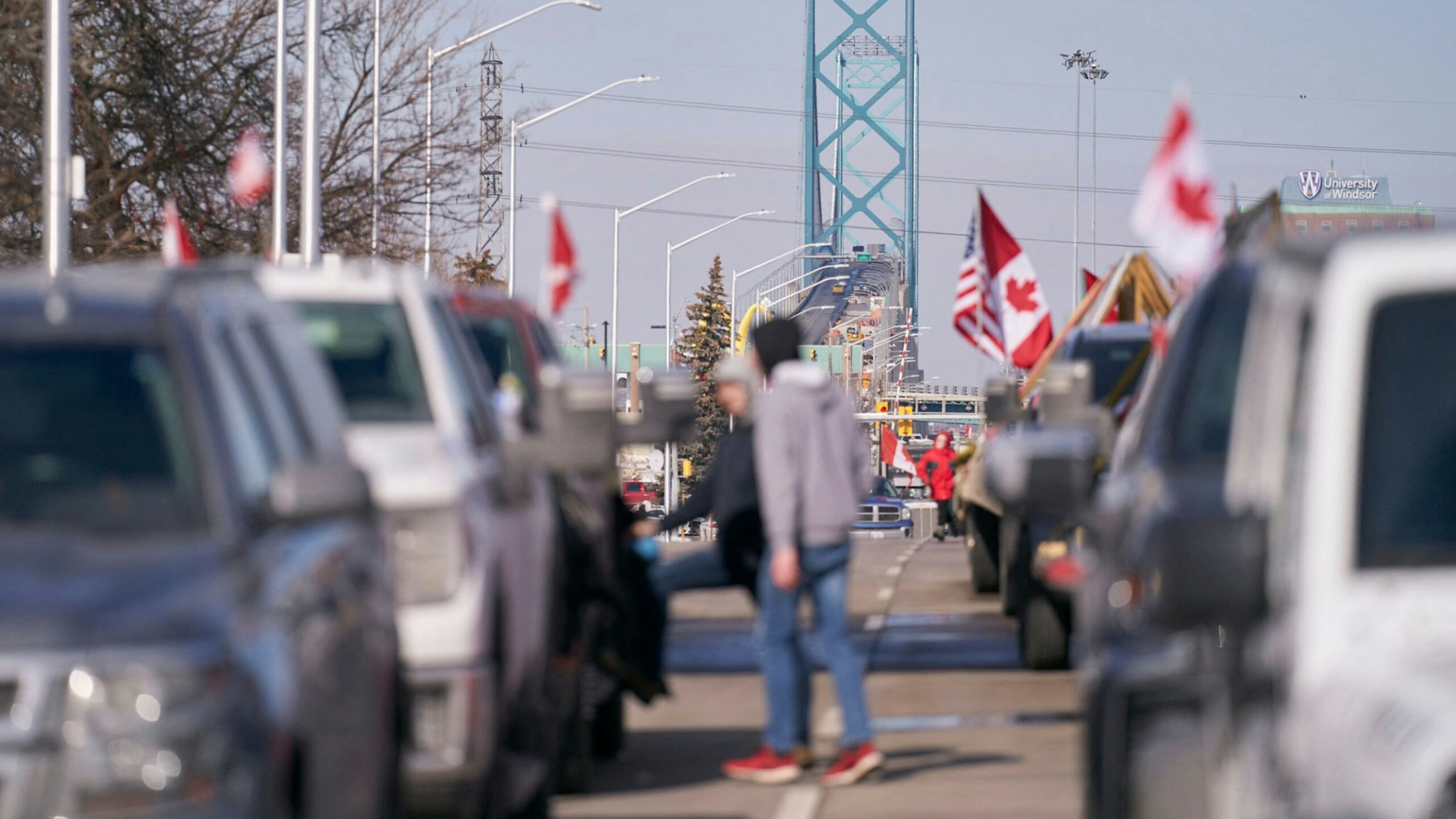 Covid-19 mandate protesters block the roadway at the Ambassador Bridge border crossing with the US, in Windsor, Ontario, on February 9, 2022.