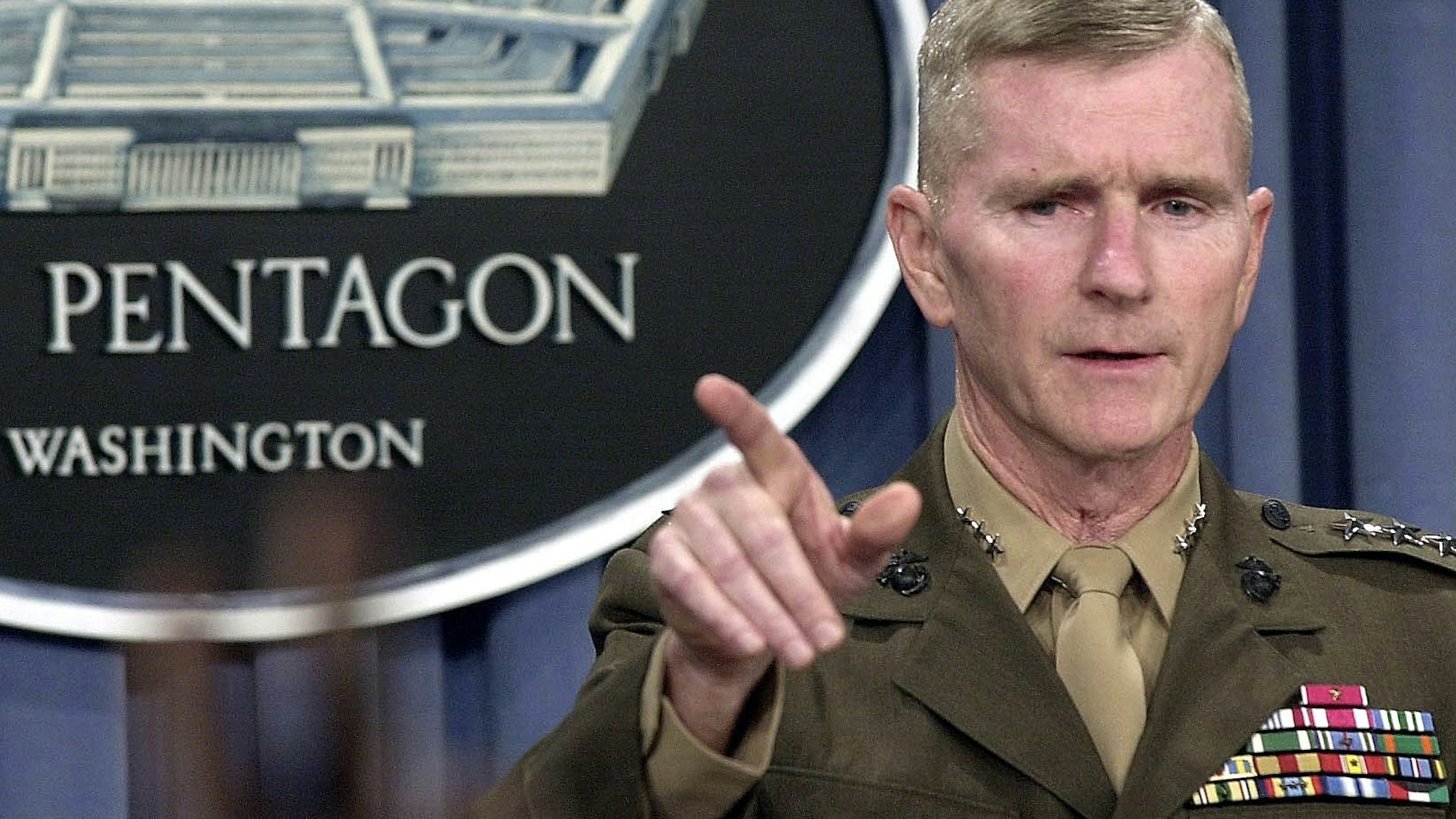 WASHINGTON, UNITED STATES: Lt. General Gregory Newbold,director of operations at the Pentagon's military joint staff, conducts an operational briefing 16 October 2001 at the Pentagon, in Washington DC. Newbold said US forces used more than 100 planes in 15 October bombing raids, a record in the air campaign against targets in Afghanistan. AFP PHOTO Joyce NALTCHAYAN (Photo credit should read JOYCE NALTCHAYAN/AFP via Getty Images)