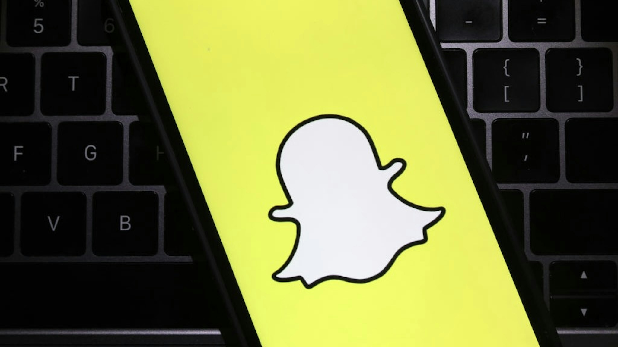 Snapchat Shares Jump On Strong Earnings Report SAN ANSELMO, CALIFORNIA - FEBRUARY 03: In this photo illustration, the Snapchat logo is displayed on a cell phone screen on February 03, 2022 in San Anselmo, California. Shares of Snapchat surged in after hours trading after the company reported a better-than-expected fourth quarter earnings. (Photo illustration by Justin Sullivan/Getty Images) Justin Sullivan / Staff