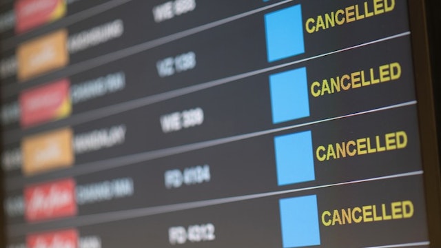 Departure flight board with cancelation at the Airport. - stock photo Departure flight board with cancelation at the Airport. IronHeart via Getty Images