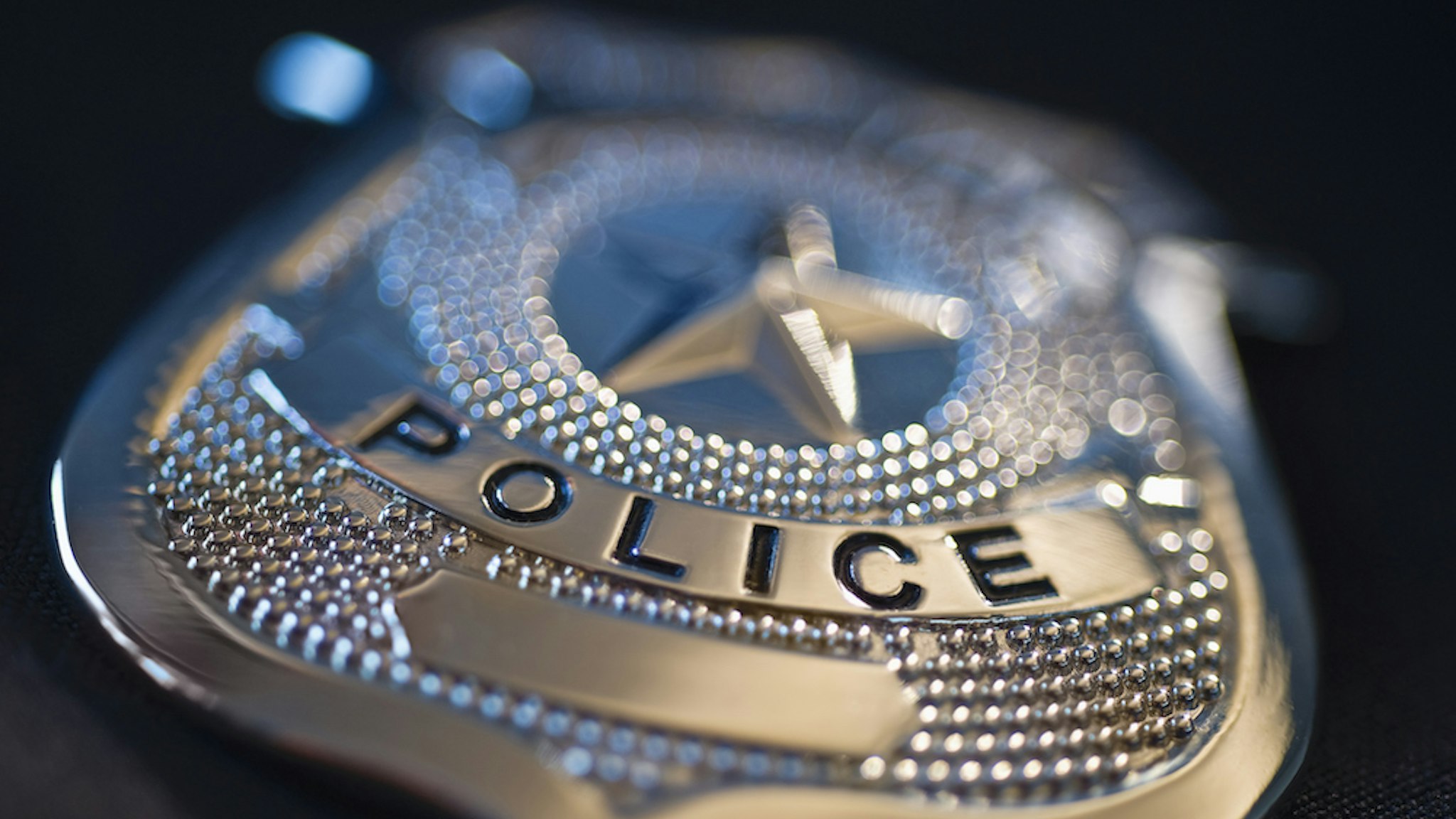 Police badge (Tetra Images/Getty Images)
