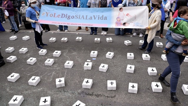 Pro-Choice And Anti-Abortion Activists Demonstrate In Colombia BOGOTA, COLOMBIA - FEBRUARY 21: Anti-abortion demonstrators hold a sign that reads "I say yes to life" during a protest outside the Justice Palace as the Constitutional Court debates the decriminalization of abortion up to 24 weeks of gestation on February 21, 2022 in Bogota, Colombia. Since 2006, abortion has been legal in Colombia only for malformation of the fetus, rape or danger to the physical or mental health of the mother. (Photo by Guillermo Legaria Schweizer/Getty Images) Guillermo Legaria Schweizer / Contributor