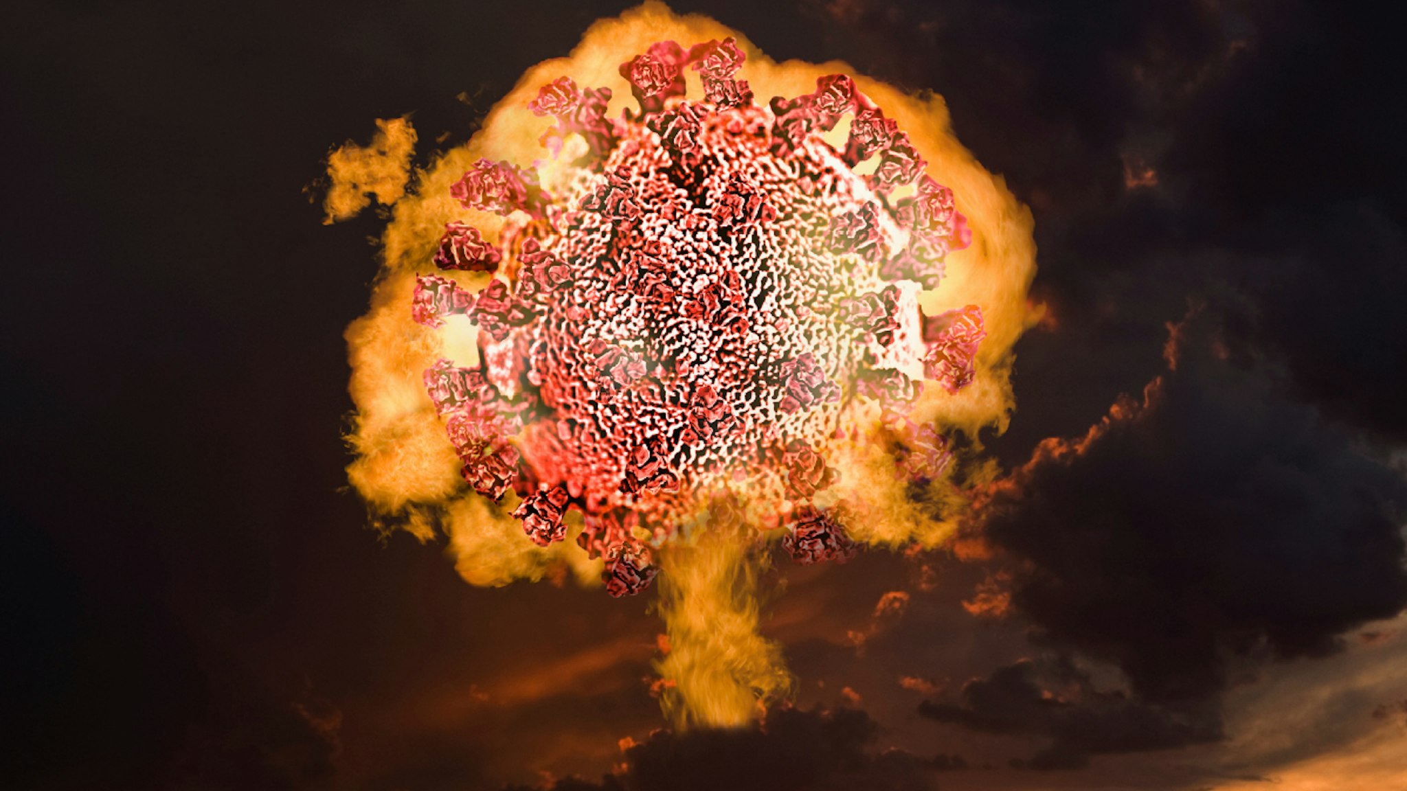 A fireball mushroom cloud rises up filled with a coronavirus molecule in an image about the explosion of coronavirus, Covid-19 and other viral diseases.