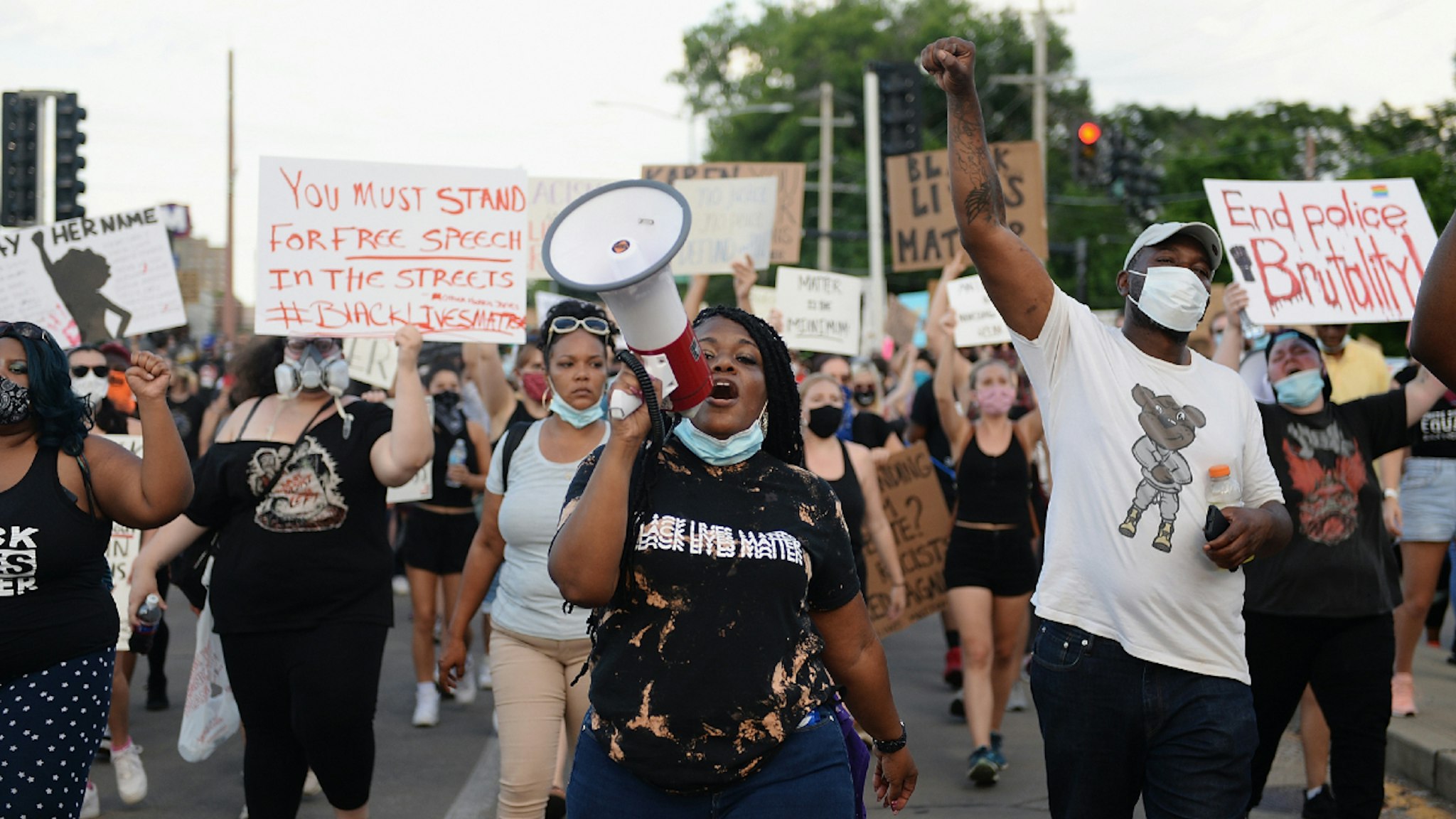 UNIVERSITY CITY, MO - JUNE 12: Missouri Democratic congressional candidate Cori Bush leads protesters as they take to the street to protest against police brutality on June 12, 2020 in University City, Missouri.