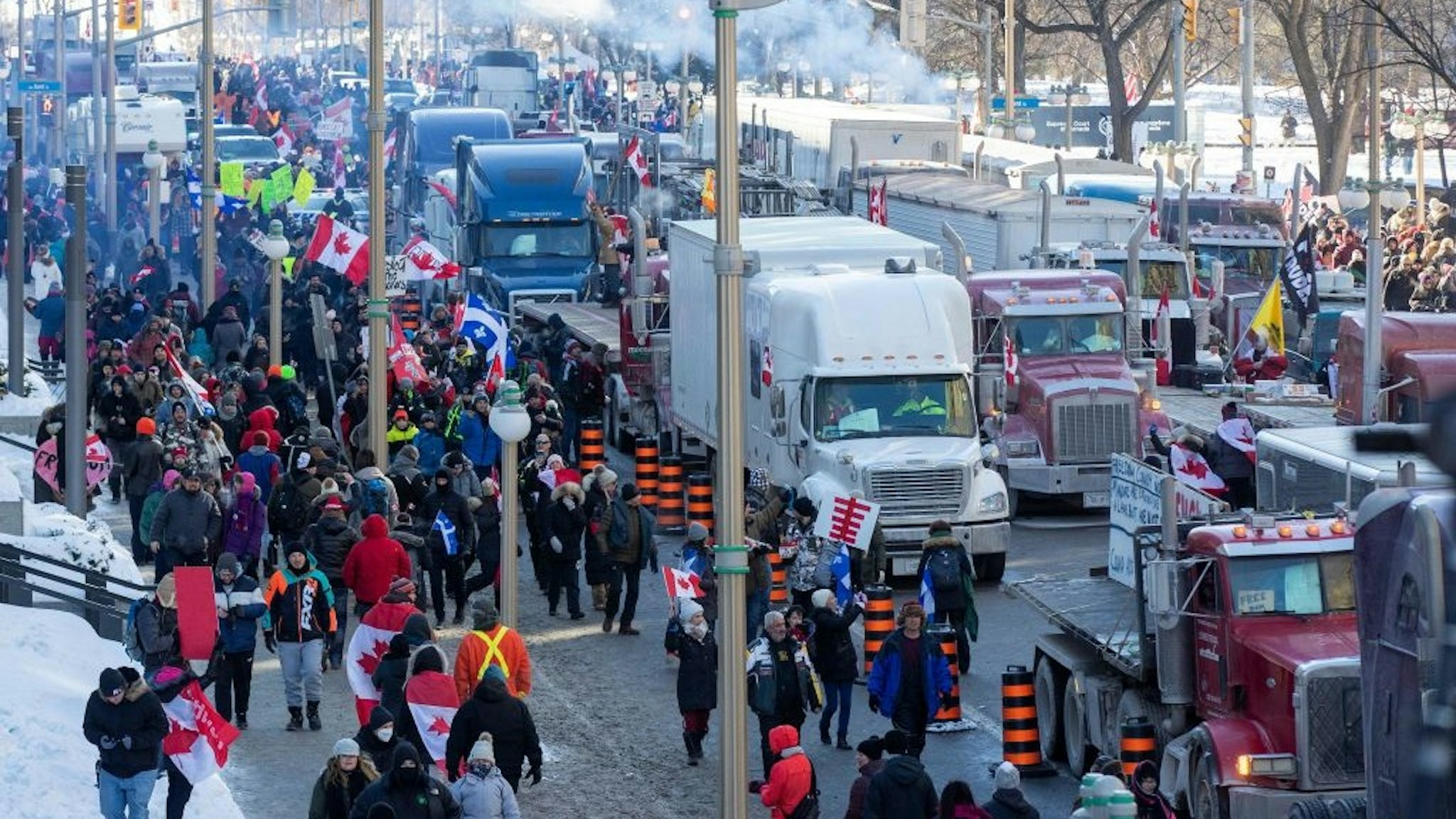 Supporters arrive at Parliament Hill for the Freedom Truck Convoy to protest against Covid-19 vaccine mandates and restrictions in Ottawa, Canada, on January 29, 2022.
