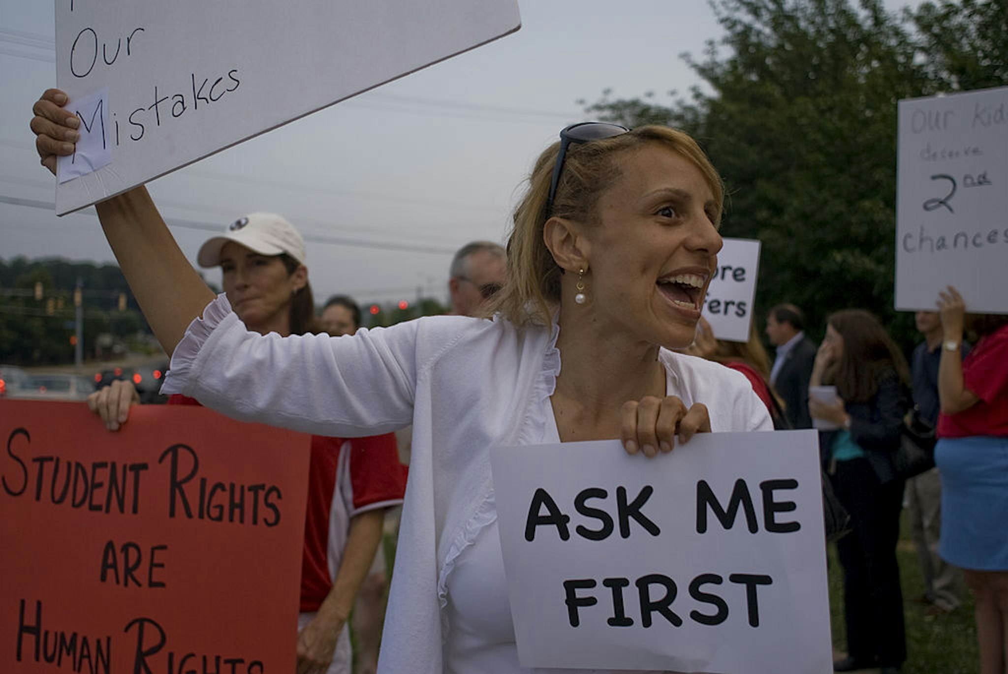 FALLS CHURCH, VA - JUNE 9: Glassman School Board candidate at large Charisse Espy protests against violation of student rights with other parents outside Luther Jackson Middle School on June 9, 2011.