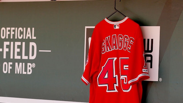 OAKLAND, CALIFORNIA - SEPTEMBER 05: The #45 jersey of recently deceased Los Angeles Angels player Tyler Skaggs hangs in the team's dugout before the game against the Los Angeles Angels at Ring Central Coliseum on September 05, 2019 in Oakland, California. (Photo by Lachlan Cunningham/Getty Images)