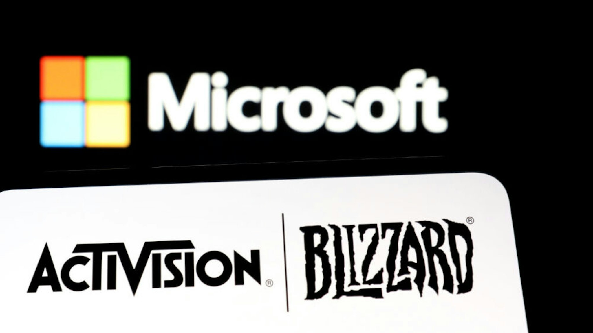 ANKARA, TURKIYE - JANUARY 18: In this photo illustration, the logos of Microsoft and Activision Blizzard are displayed in Ankara, Turkiye on January 18, 2022.