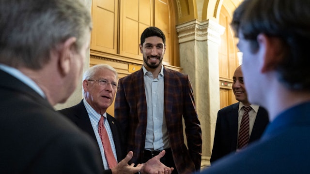 WASHINGTON, DC - FEBRUARY 17: (L-R) Sen. Roger Wicker (R-MS) speaks with former NBA player Enes Kanter Freedom at the U.S. Capitol on February 17, 2022 in Washington, DC. On Thursday, the Senate is trying to pass another short-term spending bill that would fund the government through March 11 and avoid a potential government shutdown. (Photo by Drew Angerer/Getty Images)