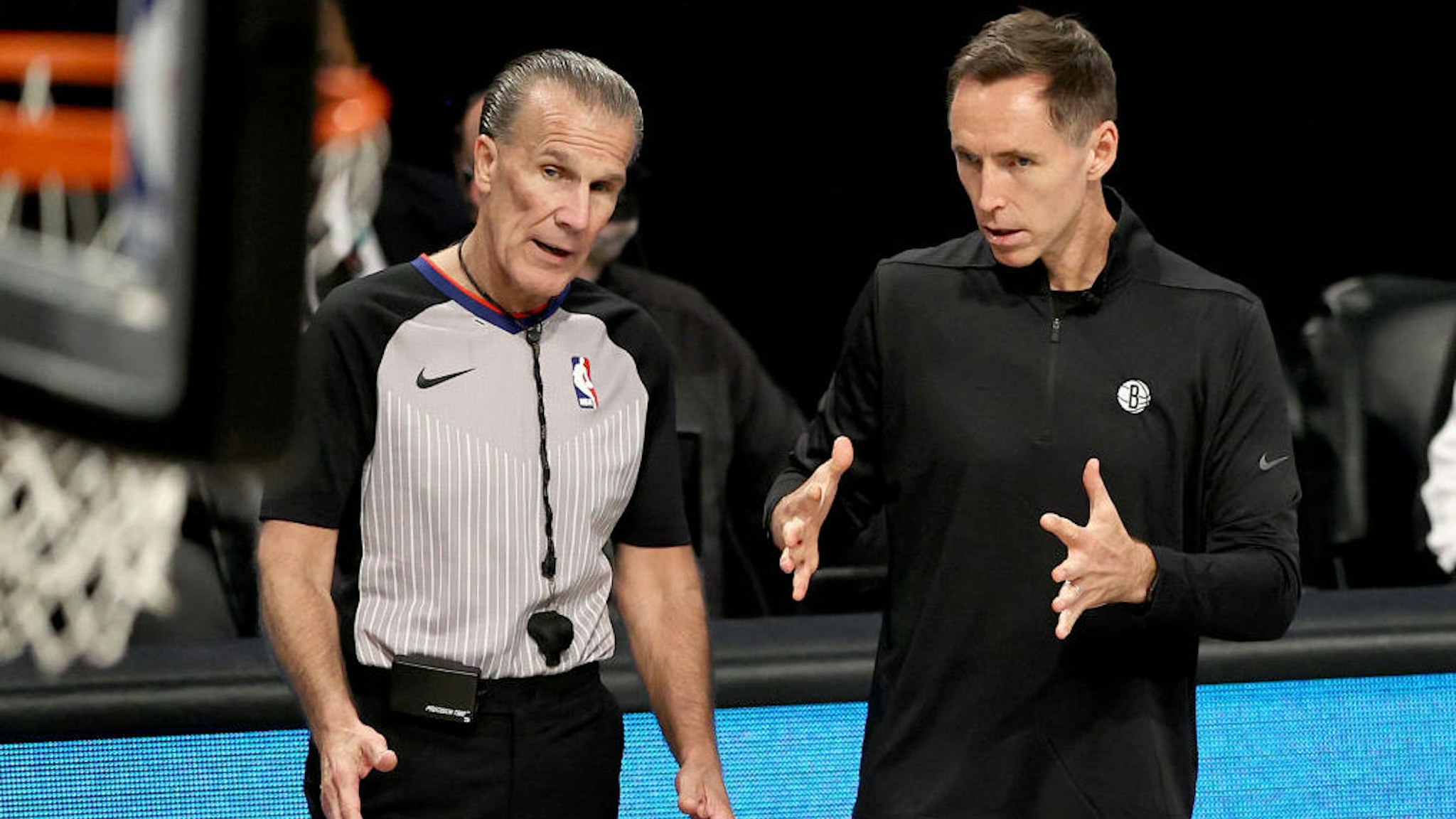 NEW YORK, NEW YORK - JUNE 15: Head coach Steve Nash talks with referee Ken Mauer #41 during game 5 of the Eastern Conference second round at Barclays Center on June 15, 2021 in the Brooklyn borough of New York City. NOTE TO USER: User expressly acknowledges and agrees that, by downloading and or using this photograph, User is consenting to the terms and conditions of the Getty Images License Agreement. (Photo by Elsa/Getty Images)