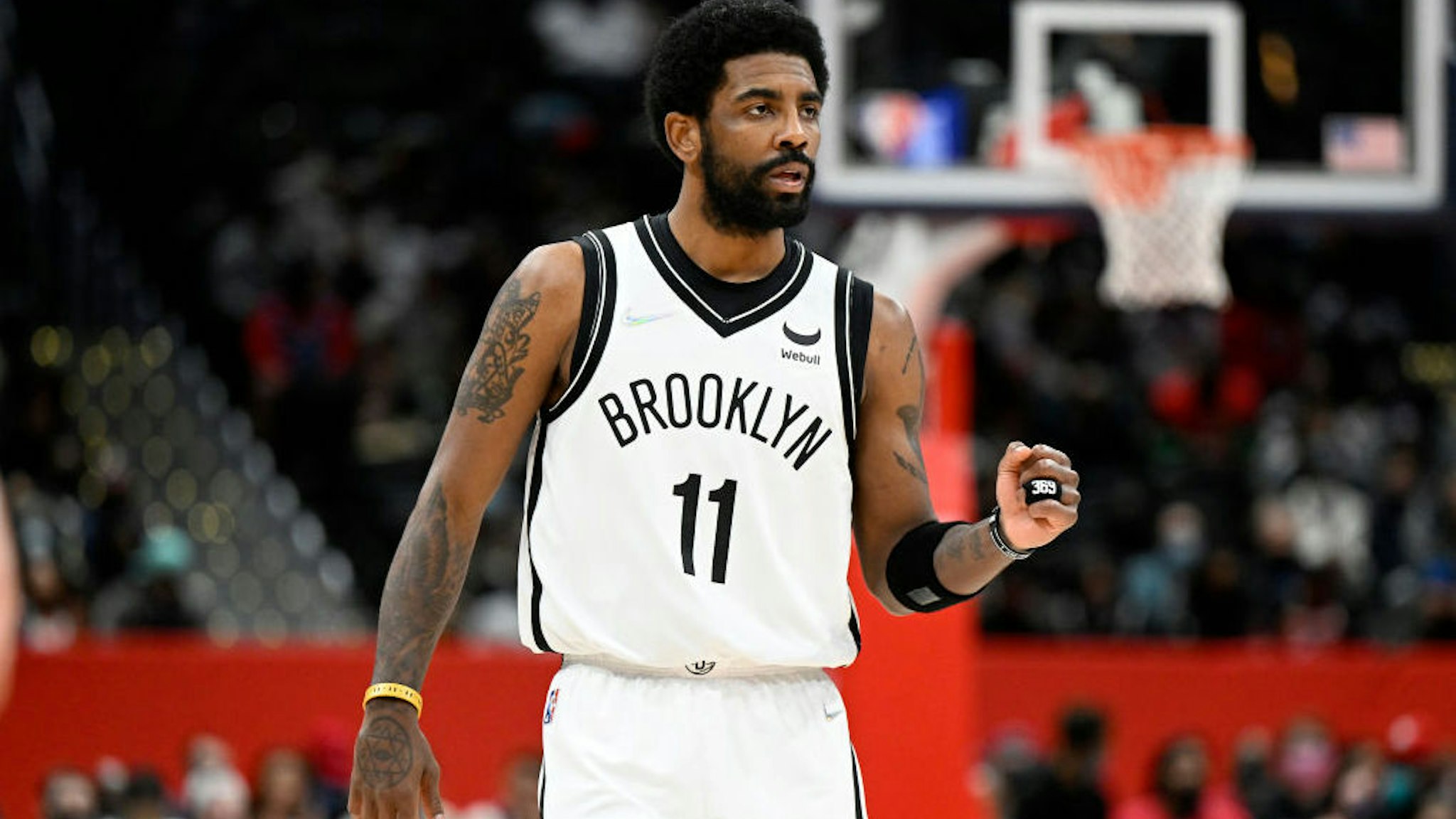 WASHINGTON, DC - FEBRUARY 10: Kyrie Irving #11 of the Brooklyn Nets gestures during the second quarter against the Washington Wizards at Capital One Arena on February 10, 2022 in Washington, DC. NOTE TO USER: User expressly acknowledges and agrees that, by downloading and or using this photograph, User is consenting to the terms and conditions of the Getty Images License Agreement. (Photo by Greg Fiume/Getty Images)