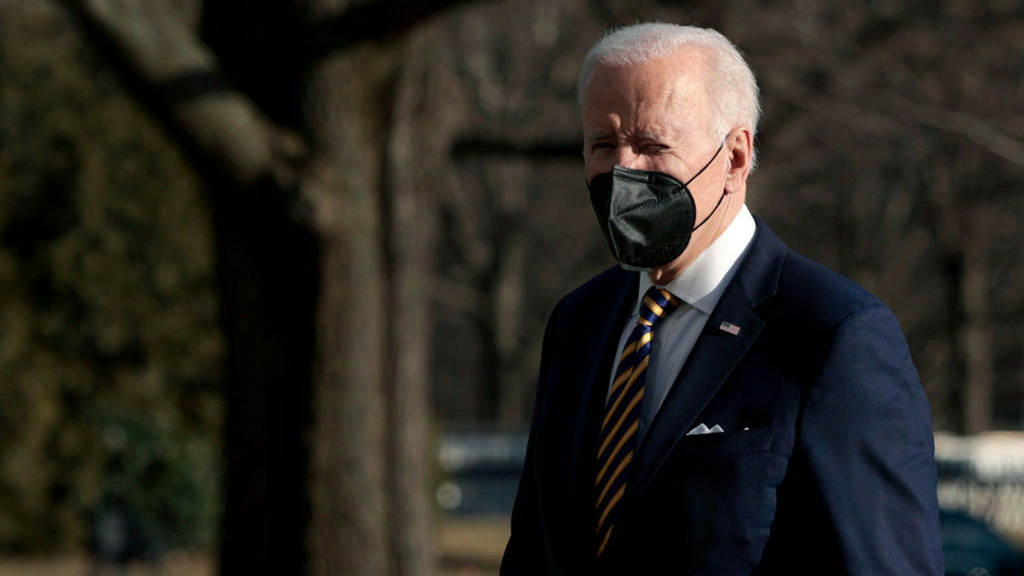 WASHINGTON, DC - FEBRUARY 10: U.S. President Joe Biden walks across the South Lawn after returning on Marine One to the White House on February 10, 2022 in Washington, DC. President Biden spent the afternoon in Culpeper, Virginia, where he delivered remarks on the work his administration has done to lower health care costs and prescription drug prices. (Photo by Anna Moneymaker/Getty Images)