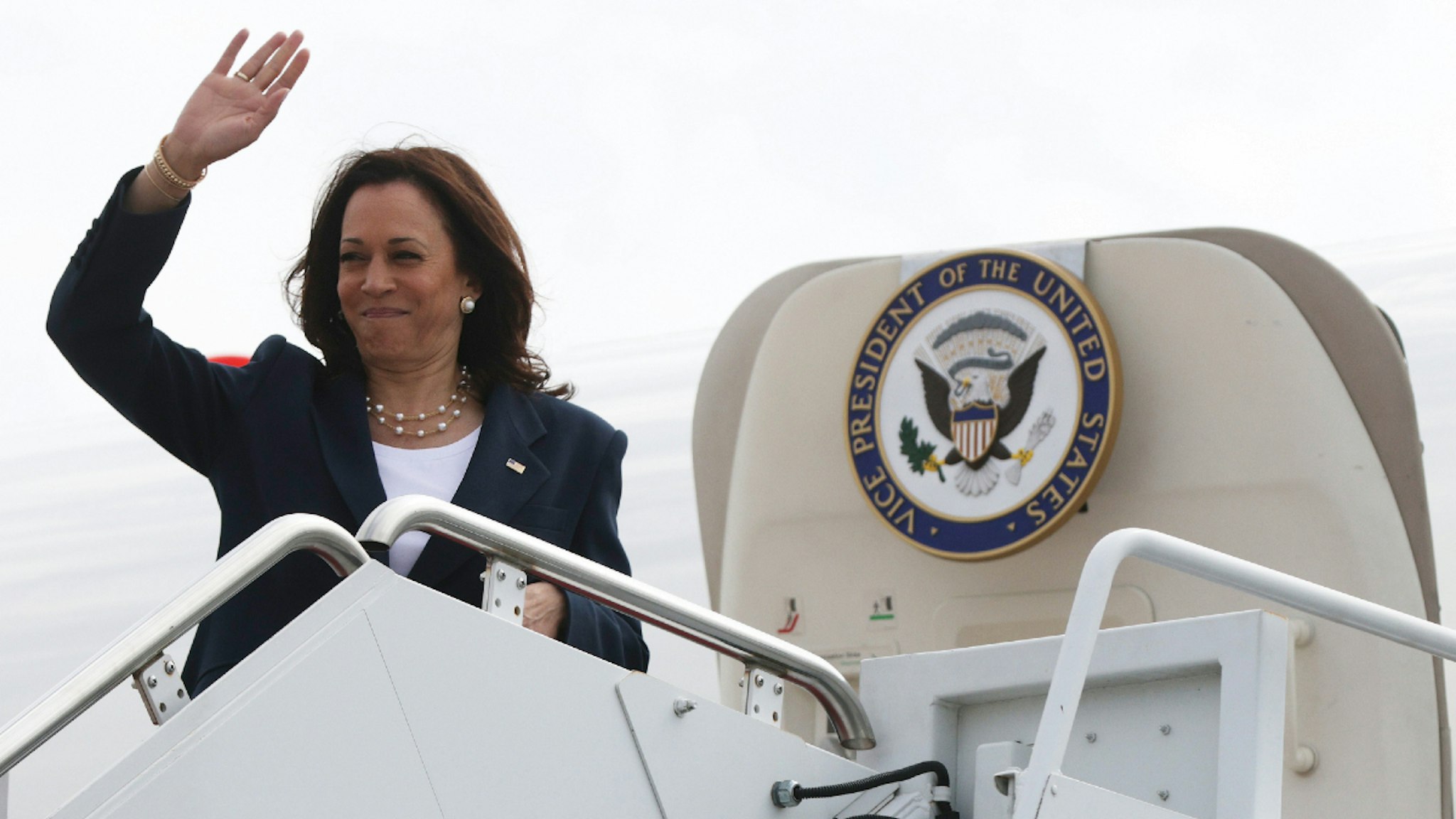 JOINT BASE ANDREWS, MARYLAND - JUNE 14: U.S. Vice President Kamala Harris waves as she boards Air Force Two June 14, 2021 in Joint Base Andrews, Maryland. Vice President Harris is traveling to Greenville, South Carolina, as part of a nationwide tour to encourage people to get vaccinated and highlight the administration's Covid vaccination efforts and initiatives