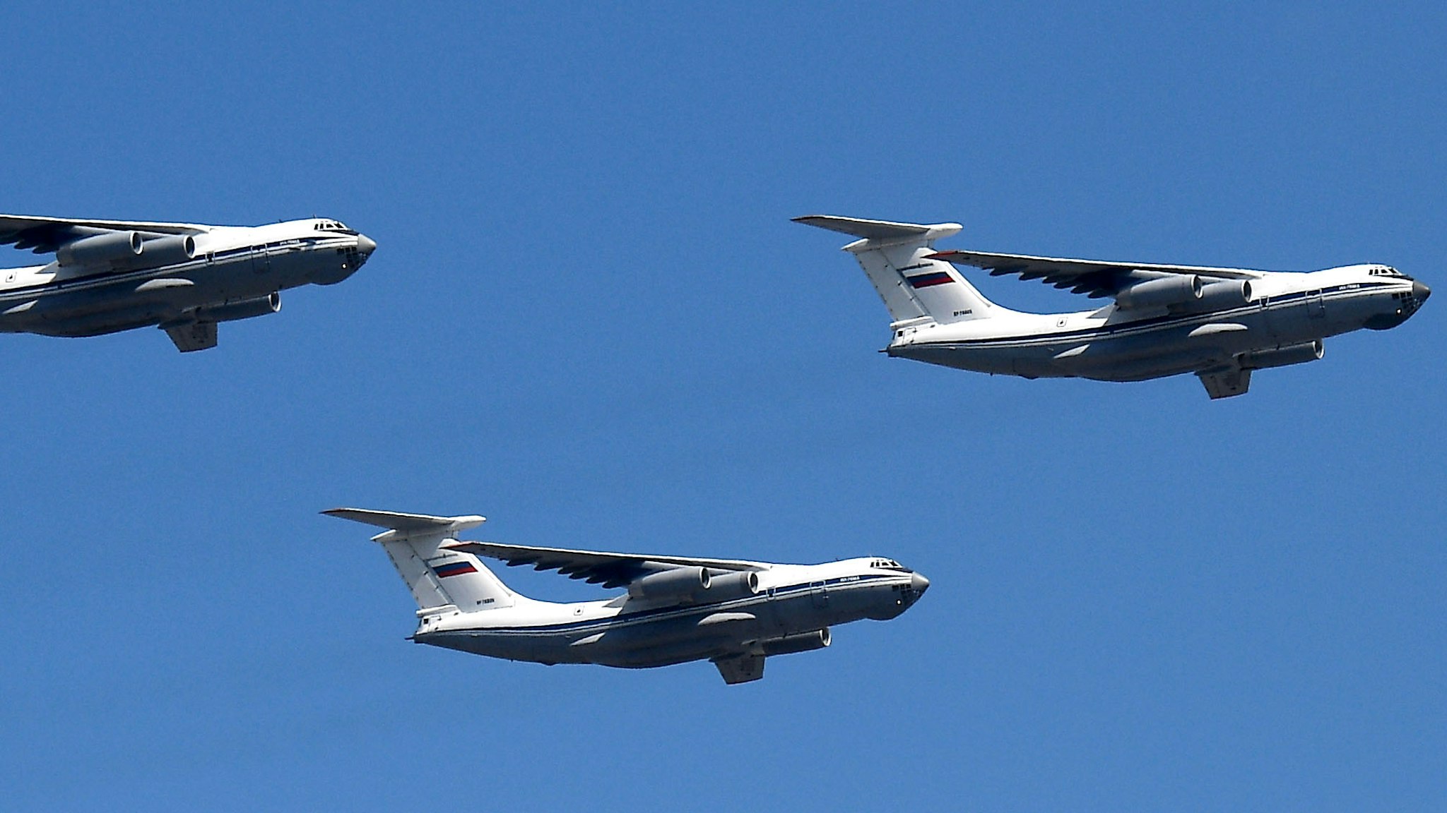 MOSCOW, RUSSIA - JUNE 24: Ilyushin Il-76 transport planes perform a flypast over Red Square during the Victory Day military parade marking the 75th anniversary of the victory in World War II, on June 24, 2020 in Moscow, Russia. The 75th-anniversary marks the end of the Great Patriotic War when the Nazi's capitulated to the then Soviet Union.