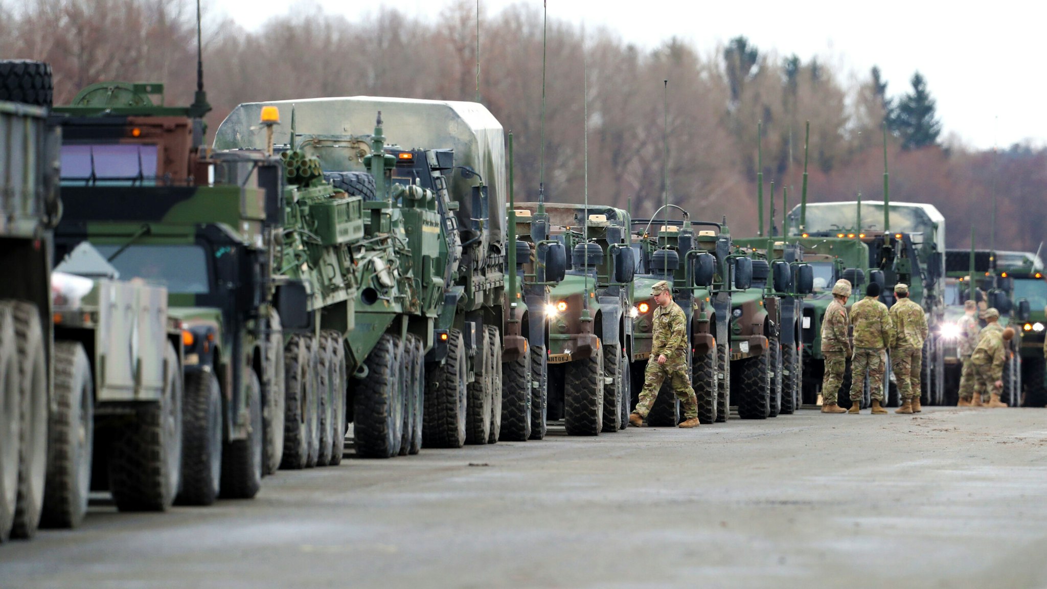 VILSECK, GERMANY - FEBRUARY 09: Soldiers of 2nd Squadron, 2nd Cavalry Regiment of the U.S. Army are pictured during the preparation of armoured combat vehicles before deploying to Romania on February 09, 2022 in Vilseck, Germany. The troops will join other US troops already there as part of a coordinated deployment of NATO forces across eastern Europe. The effort is part of NATO's response to the large-scale build up of Russian troops on the border to Ukraine, which has caused international fears of an imminent Russian military invasion.