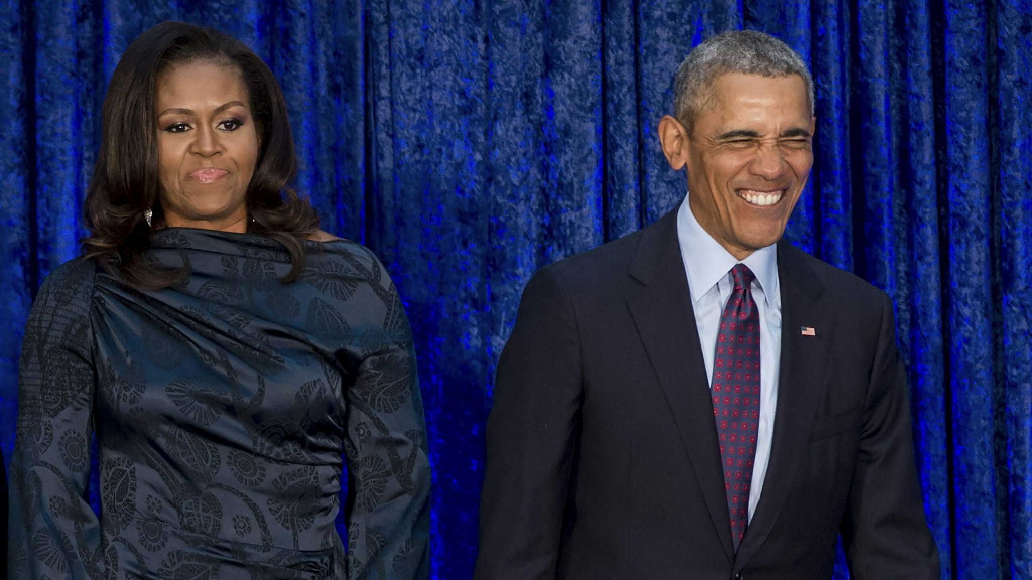 TOPSHOT - Former US President Barack Obama and former US First Lady Michelle Obama attend the unveiling of their portraits at the Smithsonian's National Portrait Gallery in Washington, DC, February 12, 2018.