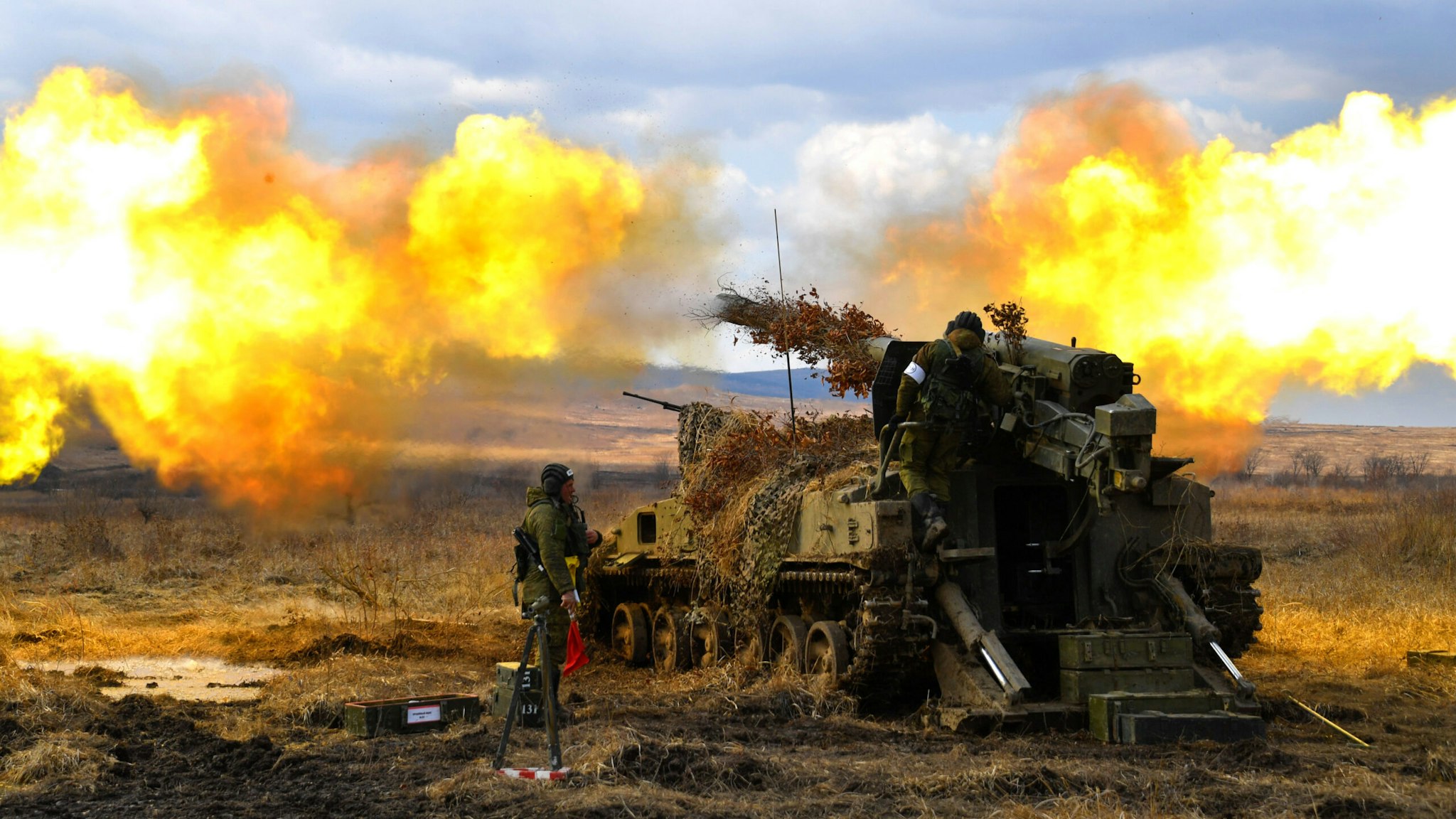 PRIMORYE TERRITORY, RUSSIA - MARCH 21, 2017: A 2S5 Giatsint self-propelled gun fires during tactical exercises held by artillery detachments of the Russian Eastern Military District's 5th Army at the Sergeyevsky training ground. Over 2500 servicemen practice combat skills received in 2017 winter training exercises.