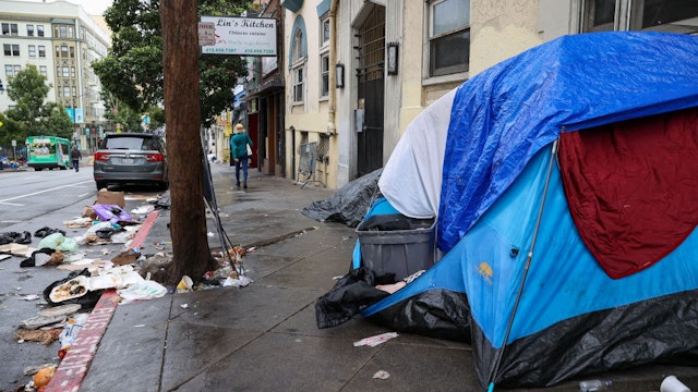 SAN FRANCISCO, CA - OCTOBER 30: Homeless people are seen on streets of the Tenderloin district in San Francisco, California, United States on October 30, 2021. Last week on Tuesday, San Francisco housing project for homeless development is rejected by a majority of the city supervisors with an 8 to 3 vote.