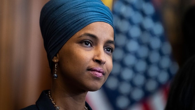Rep. Ilhan Omar, D-Minn., attends a bill enrollment ceremony for the Juneteenth National Independence Day Act in the Capitol on Thursday, June 17, 2021.