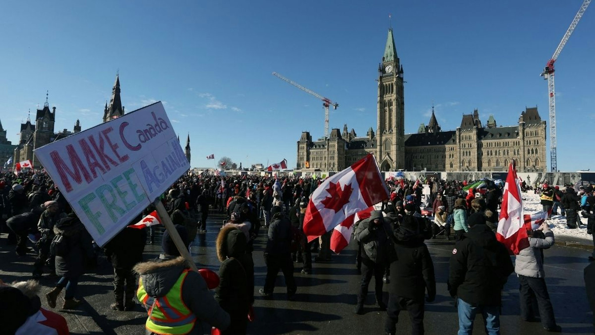 Supporters of the Freedom Convoy protest Covid-19 vaccine mandates and restrictions in front of Parliament on January 29, 2022 in Ottawa, Canada.