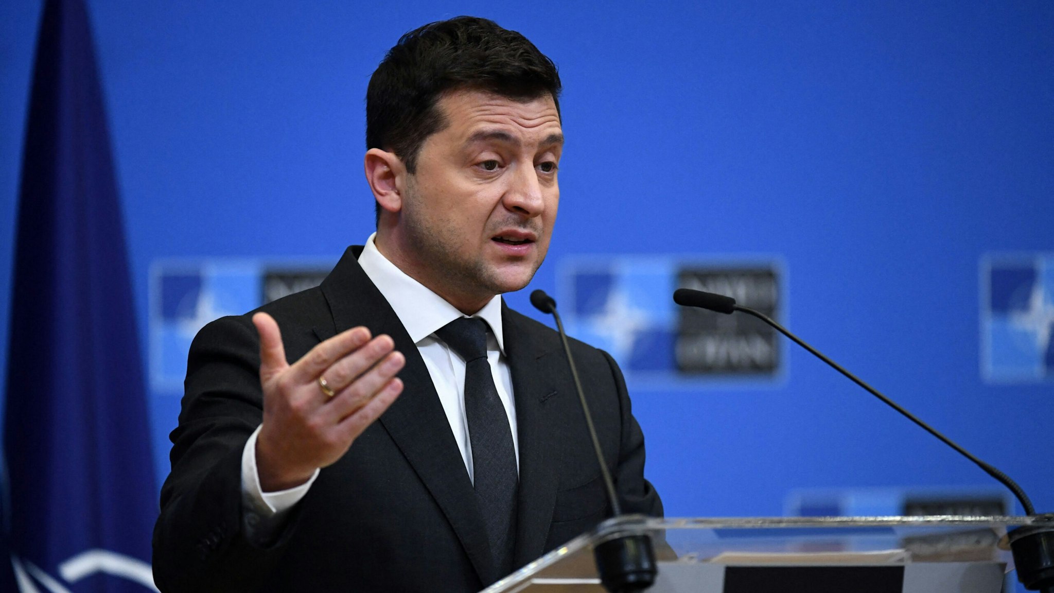 Ukrainian President Volodymyr Zelensky talks during a press conference with NATO Secretary General after their bilateral meeting at the European Union headquarters in Brussels on December 16, 2021.