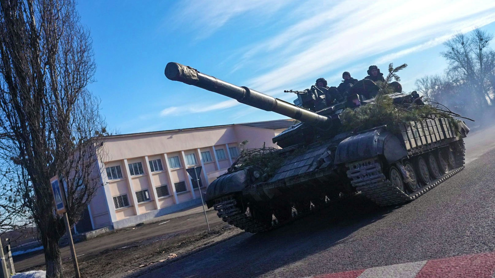 CHUHUIV, UKRAINE - FEBRUARY 24: A tank of Ukrainian forces moves as following Russia's military operation on February 24, 2022, in Chuhuiv town, Kharkiv Oblast, Ukraine.