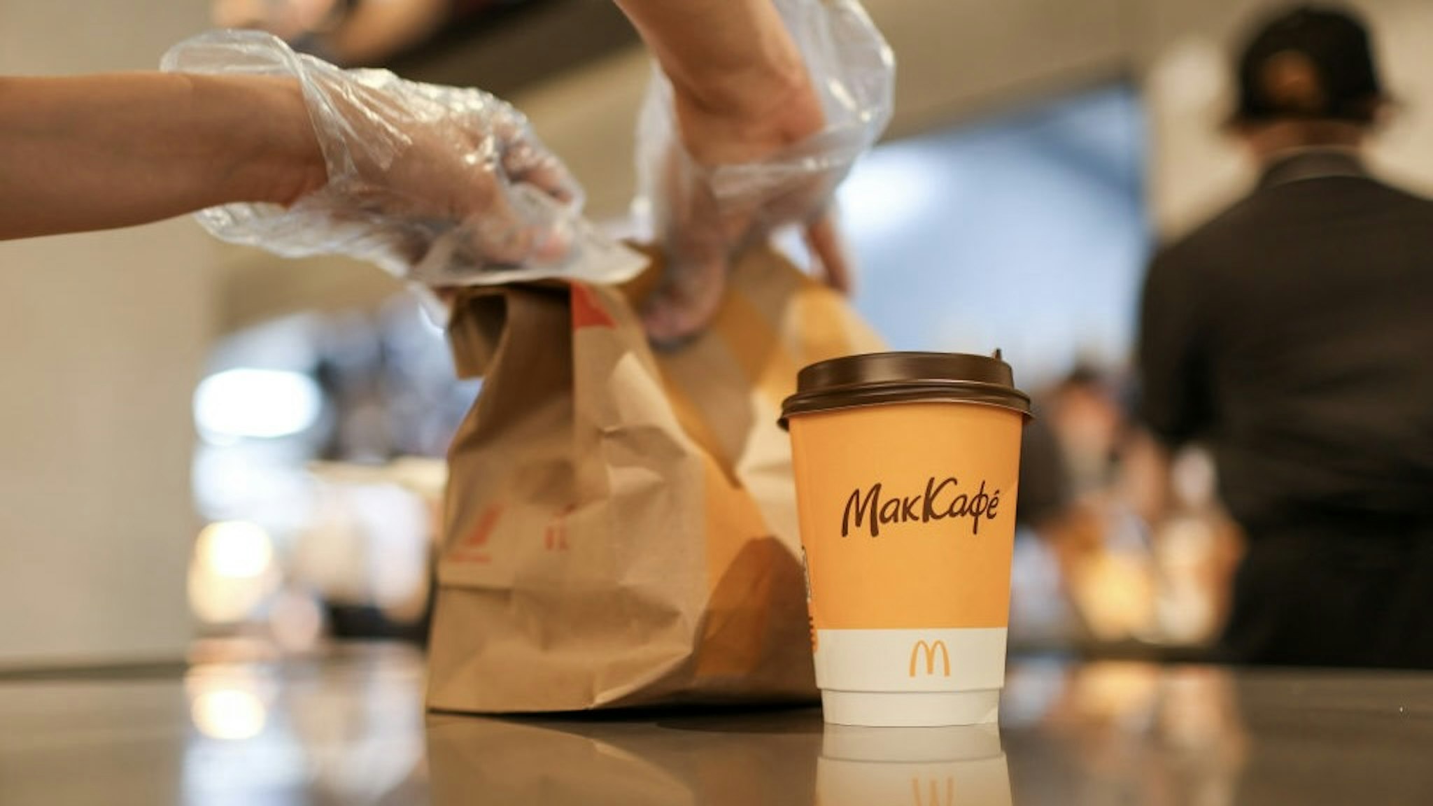 McDonalds Corp. Restaurant Under Russia's New In-Dining Restriction A McCafe branded hot beverage inside a McDonalds Corp. restaurant in Moscow, Russia, on Wednesday, June 30, 2021. This week Moscow introduced new rules to require proof of vaccination, recovery from Covid-19 or a recent negative PCR test in order to dine indoors. Photographer: Andrey Rudakov/Bloomberg via Getty Images Bloomberg / Contributor