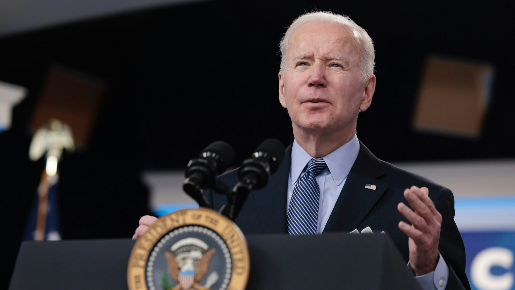 President Joe Biden gestures as he delivers remarks on Covid-19 in the United States in the South Court Auditorium on March 30, 2022 in Washington, DC.