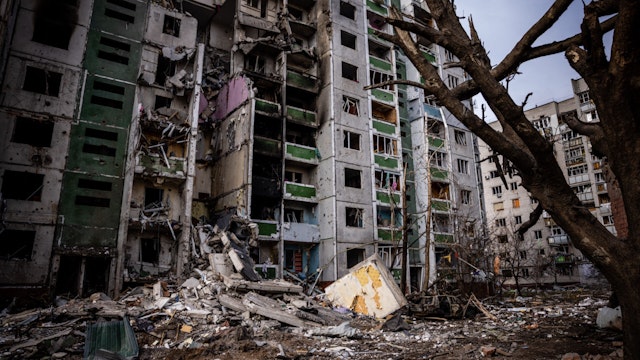 This picture taken on March 4, 2022 shows a residential building damaged during a shelling the day before in the city of Chernihiv.