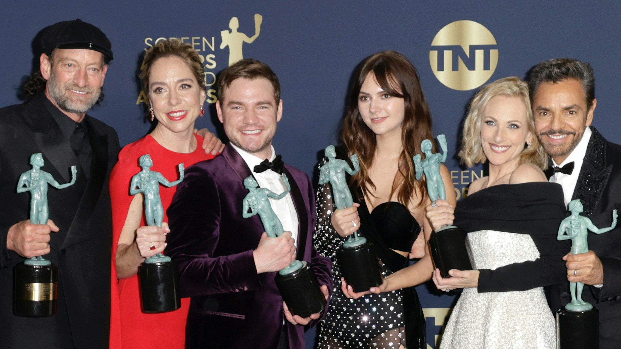 Troy Kotsur, Sian Heder, Daniel Durant, Emilia Jones, Marlee Matlin and Eugenio Derbez, winners of Outstanding Performance by a Cast in a Motion Picture for CODA, pose in the press room during the 28th Annual Screen Actors Guild Awards at Barker Hangar on February 27, 2022 in Santa Monica, California.