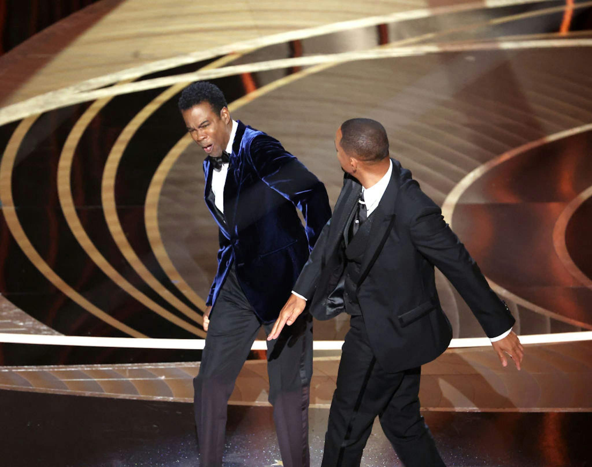 Chris Rock and Will Smith onstage during the show at the 94th Academy Awards at the Dolby Theatre at Ovation Hollywood on Sunday, March 27, 2022. (