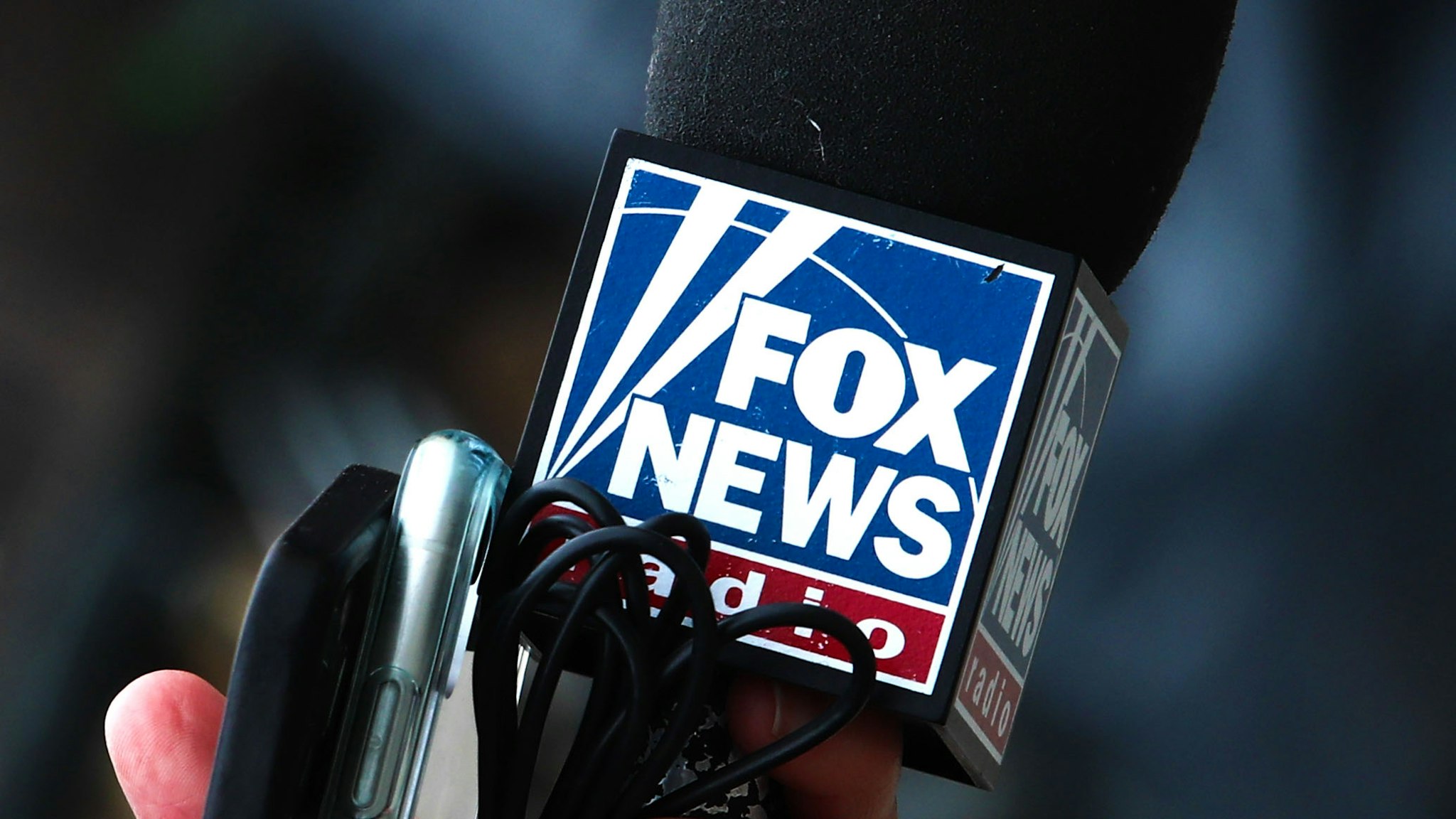Fox News logo is seen on a reporter's microphone in Przemysl, Poland on March 5, 2022.