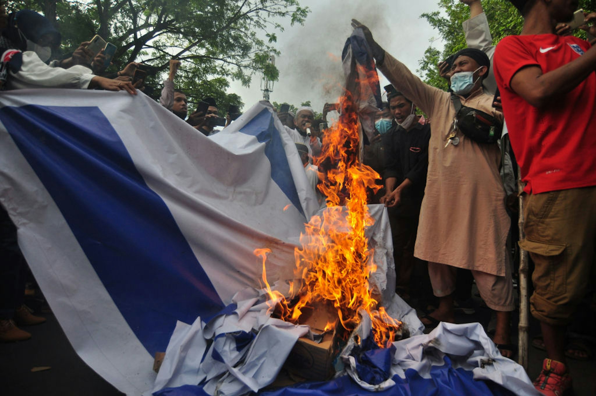 Burning Israeli flag