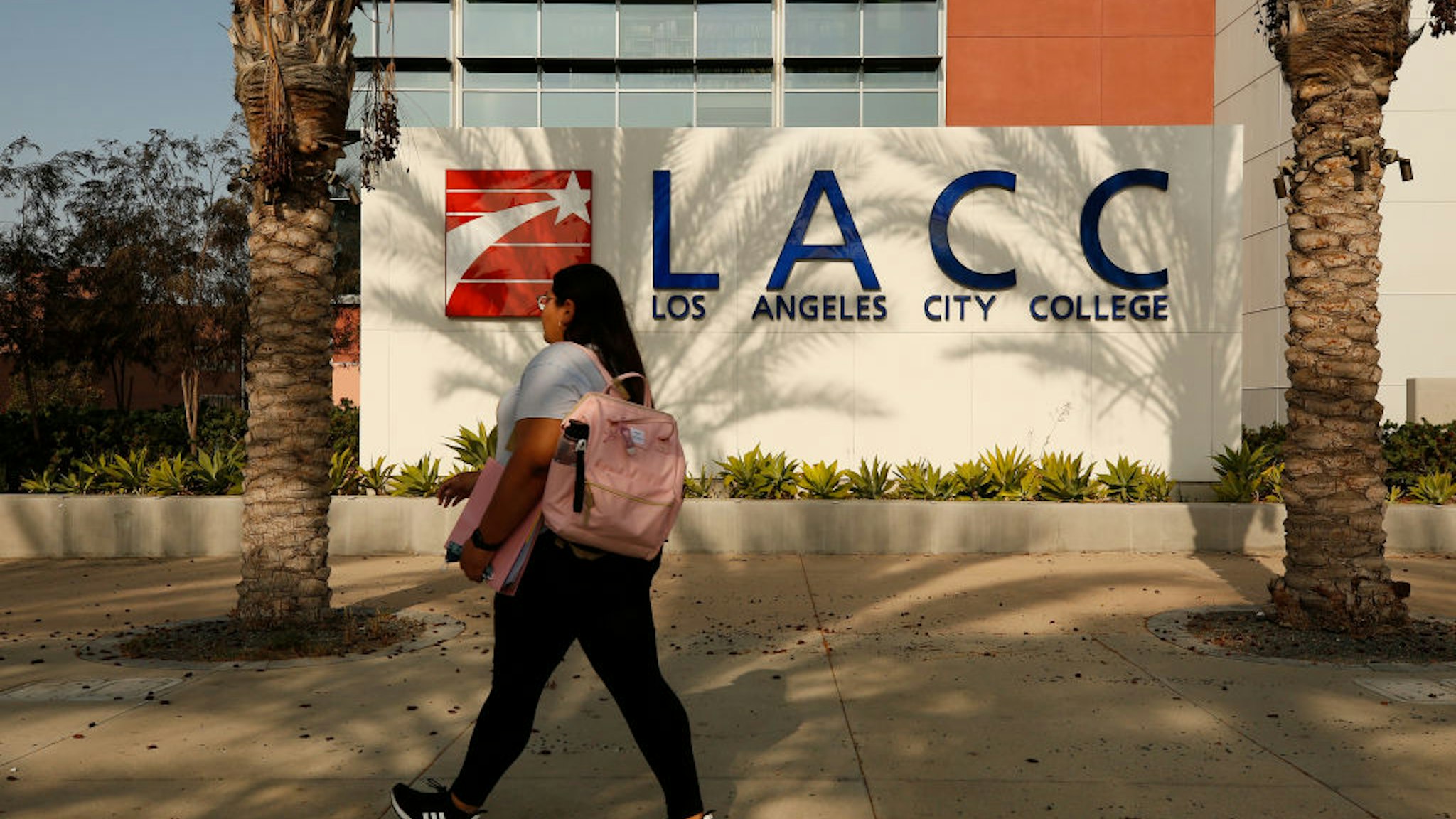 LOS ANGELES, CA - AUGUST 30: A portion of the enrolled student body returns to in-class instruction for the reopening on Monday August 30th of Los Angeles City College (LACC) in the LACCD, the nation's largest community college district. School will look a bit different this year, as masks will be required on-campus. A majority of students at LACC are continuing with online classes for this Fall semester LA City College on Monday, Aug. 30, 2021 in Los Angeles, CA. (Al Seib / Los Angeles Times via Getty Images).