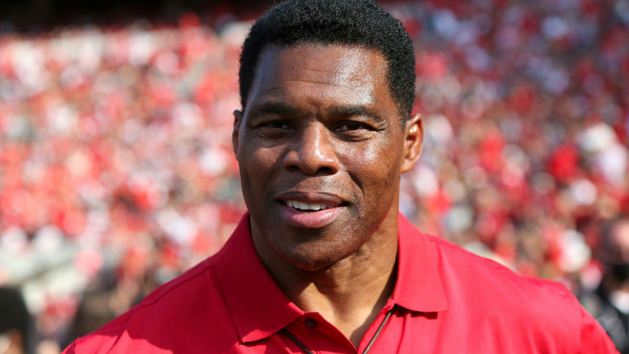 Former running back Herschel Walker for the Georgia Bulldogs on the sidelines against the UAB Blazers in the first half at Sanford Stadium on September 11, 2021 in Athens, Georgia.