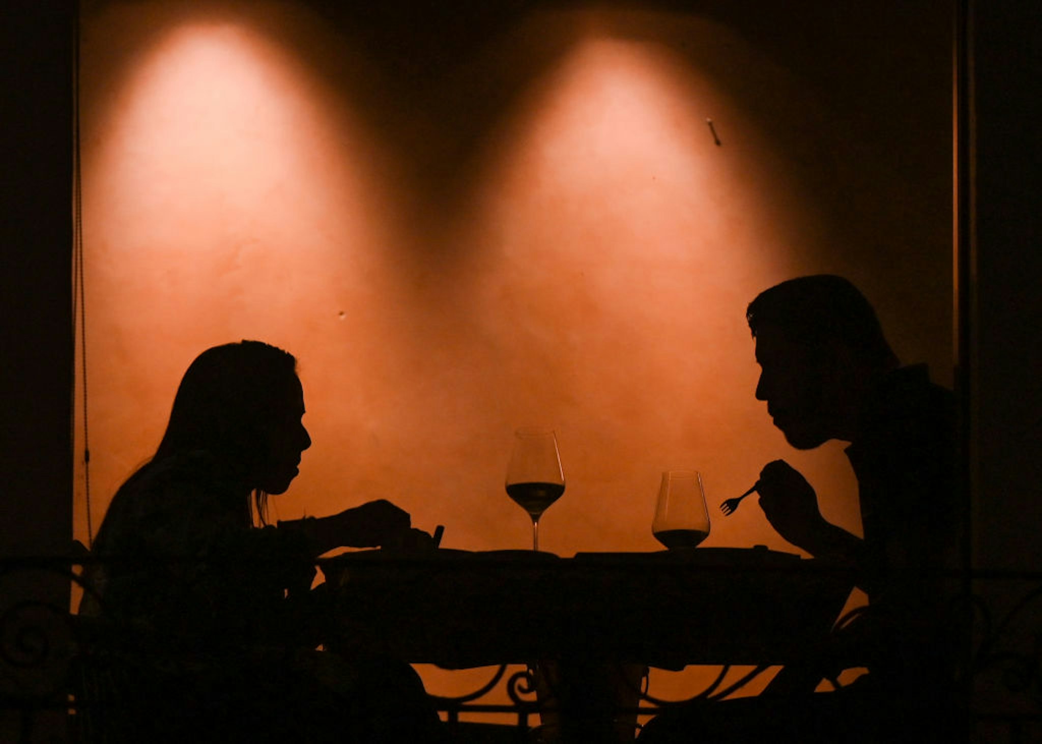 A couple enjoys a dinner in a restaurant in Merida center. On Sunday, February 13, 2022, in Merida, Yucatan, Mexico.