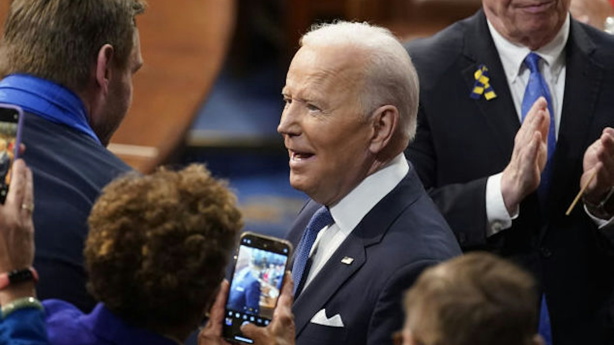 .S. President Joe Biden, center, arrives to deliver a State of the Union address at the U.S. Capitol in Washington, D.C., U.S., on Tuesday, March 1, 2022.