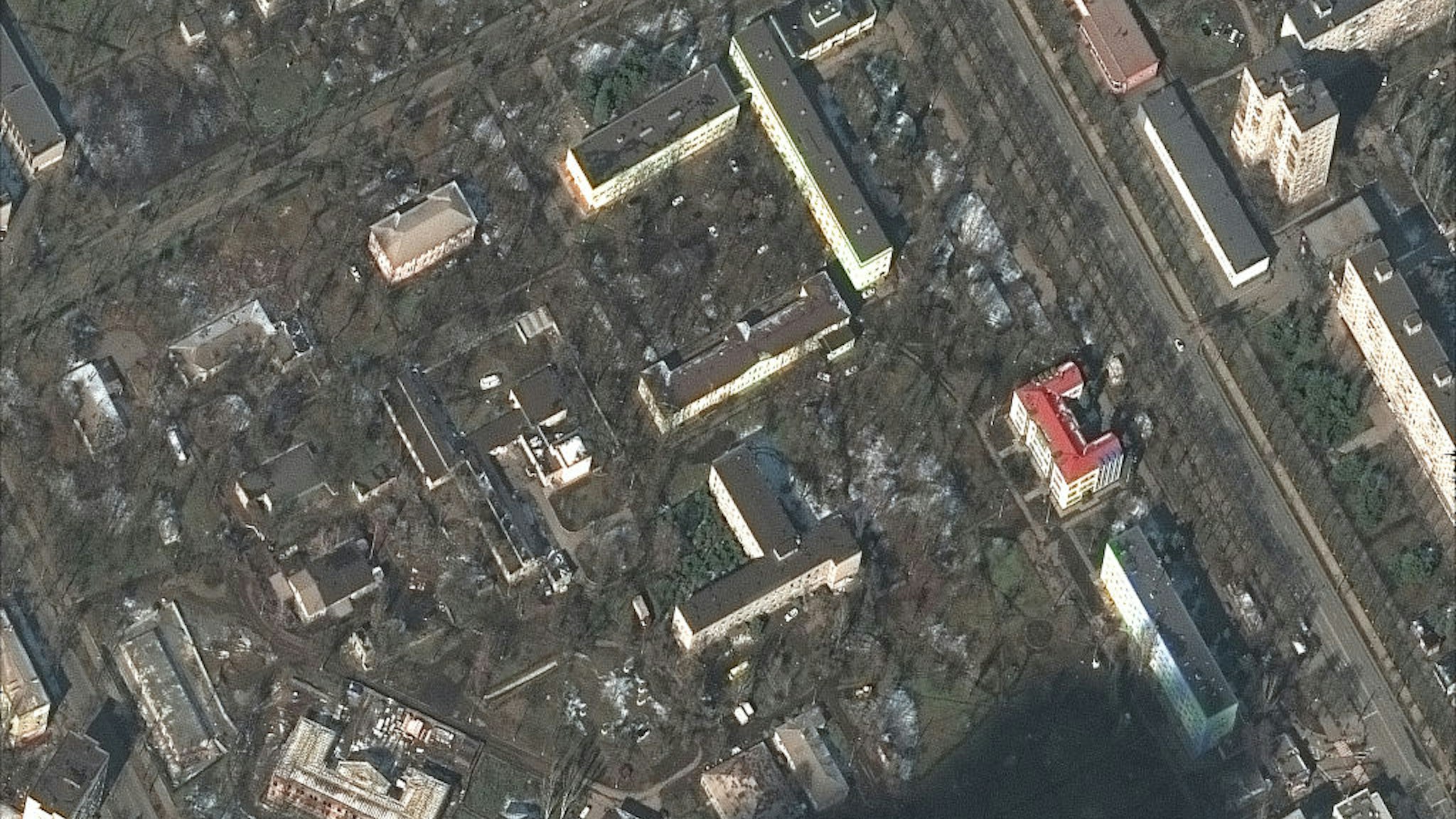 RUSSIANS INVADE UKRAINE -- MARCH 9, 2022: 09 Maxar satellite imagery of Mariupol Childrens Hospital and buildings BEFORE the bombing-- in Mariupol, Ukraine. Imagery was captured before the building was bombed. 9mar2022_wv3. Please use: Satellite image (c) 2022 Maxar Technologies.