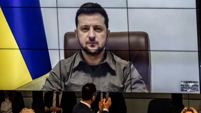 BERLIN, GERMANY - MARCH 17: Ukrainian President Volodymyr Zelensky addresses the Bundestag via live video from the embattled city of Kyiv on March 17, 2022 in Berlin, Germany. Zelensky has been pleading NATO member states to enforce a no-fly zone over Ukraine, which NATO has so far declined, citing the need to avoid a direct military confrontation with Russia.