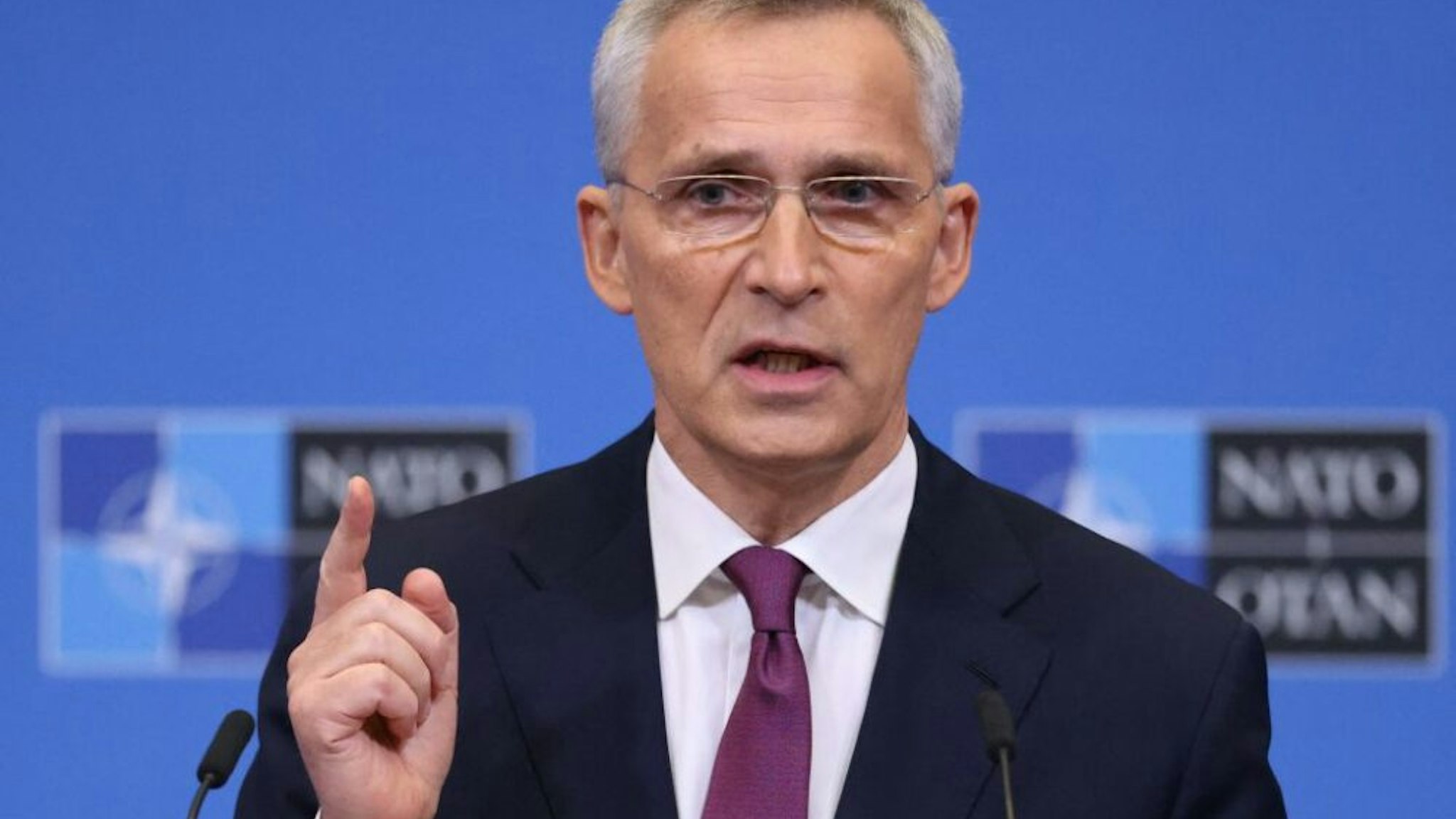 NATO Secretary General Jens Stoltenberg addresses a press conference at NATO Headquarters in Brussels on March 23, 2022.