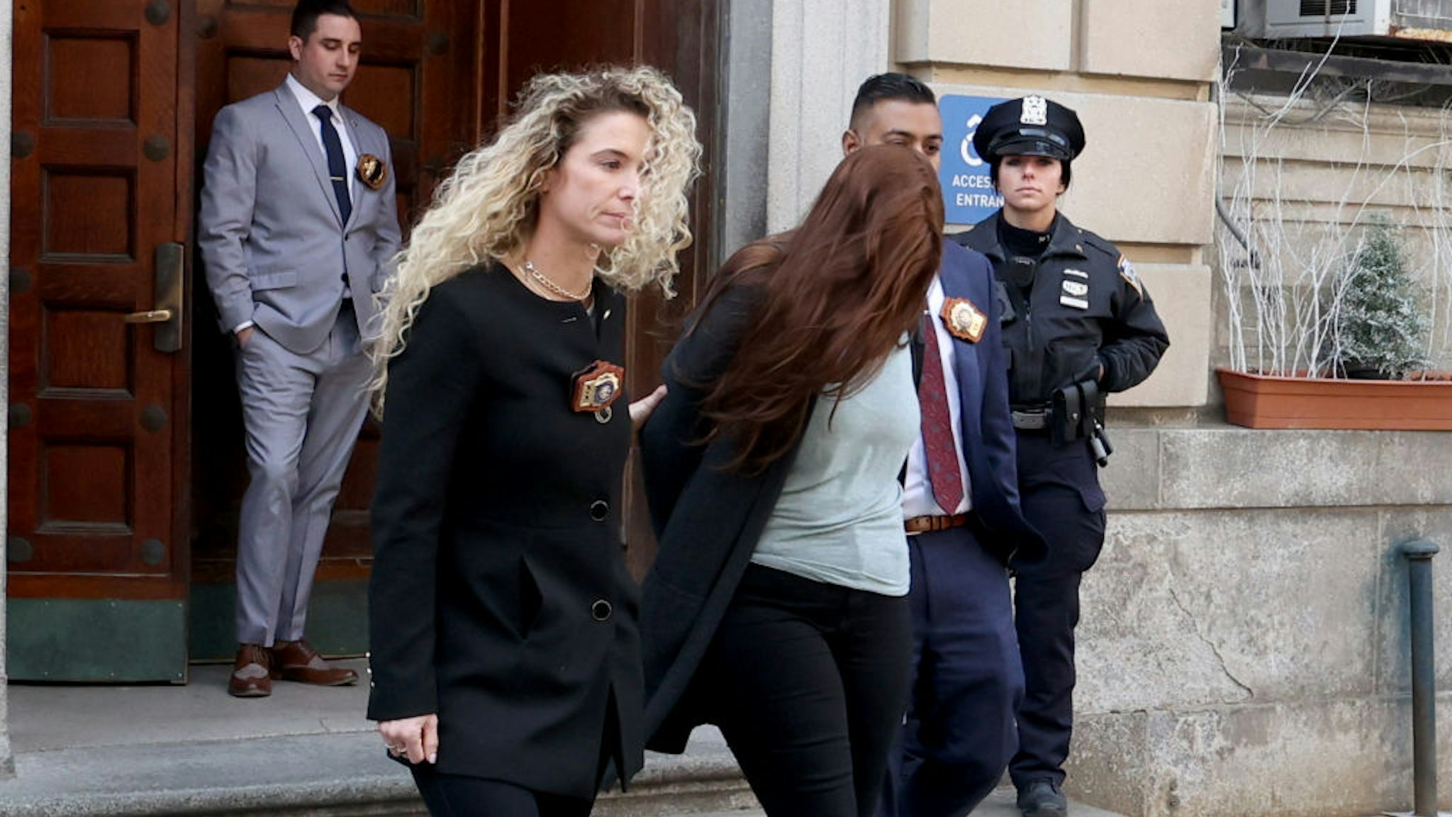 NYPD 10th Precinct Detectives walk 26 years old Lauren Pazienza to face Manslaughter charges for the shoving 87-year-old Lauren Maker Gustern. Lauren Pazienza, 26, turned herself at the NYPD 10th precinct and was charged with manslaughter for allegedly shoving Barbara Maier Gustern, 87, while running down a New York City street on March 10.