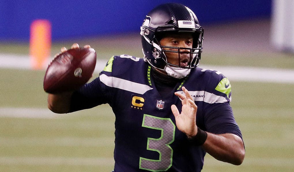 SEATTLE, WASHINGTON - SEPTEMBER 20: Russell Wilson #3 of the Seattle Seahawks looks to pass during the second half against the New England Patriots at CenturyLink Field on September 20, 2020 in Seattle, Washington. (Photo by Abbie Parr/Getty Images)