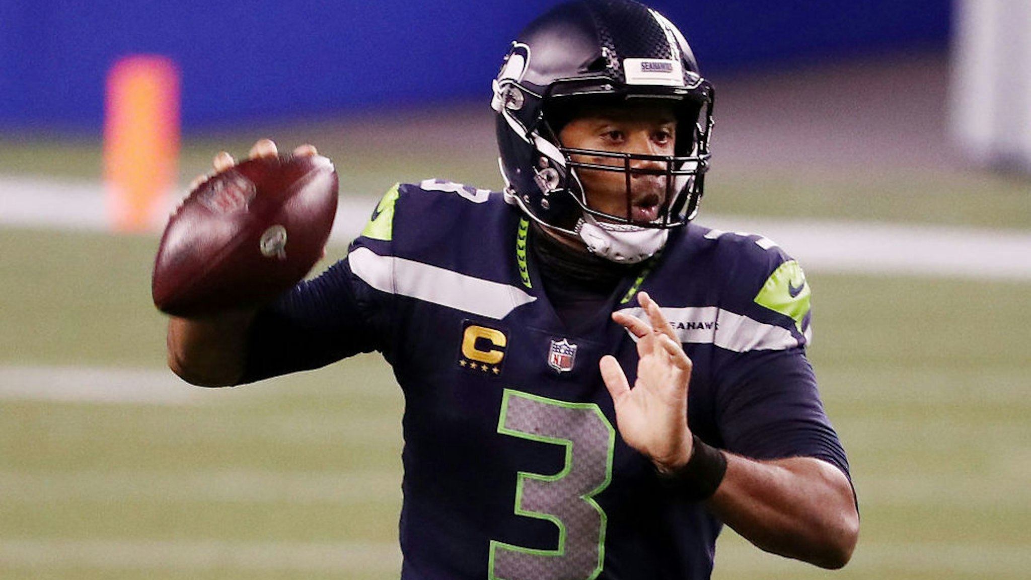 SEATTLE, WASHINGTON - SEPTEMBER 20: Russell Wilson #3 of the Seattle Seahawks looks to pass during the second half against the New England Patriots at CenturyLink Field on September 20, 2020 in Seattle, Washington. (Photo by Abbie Parr/Getty Images)