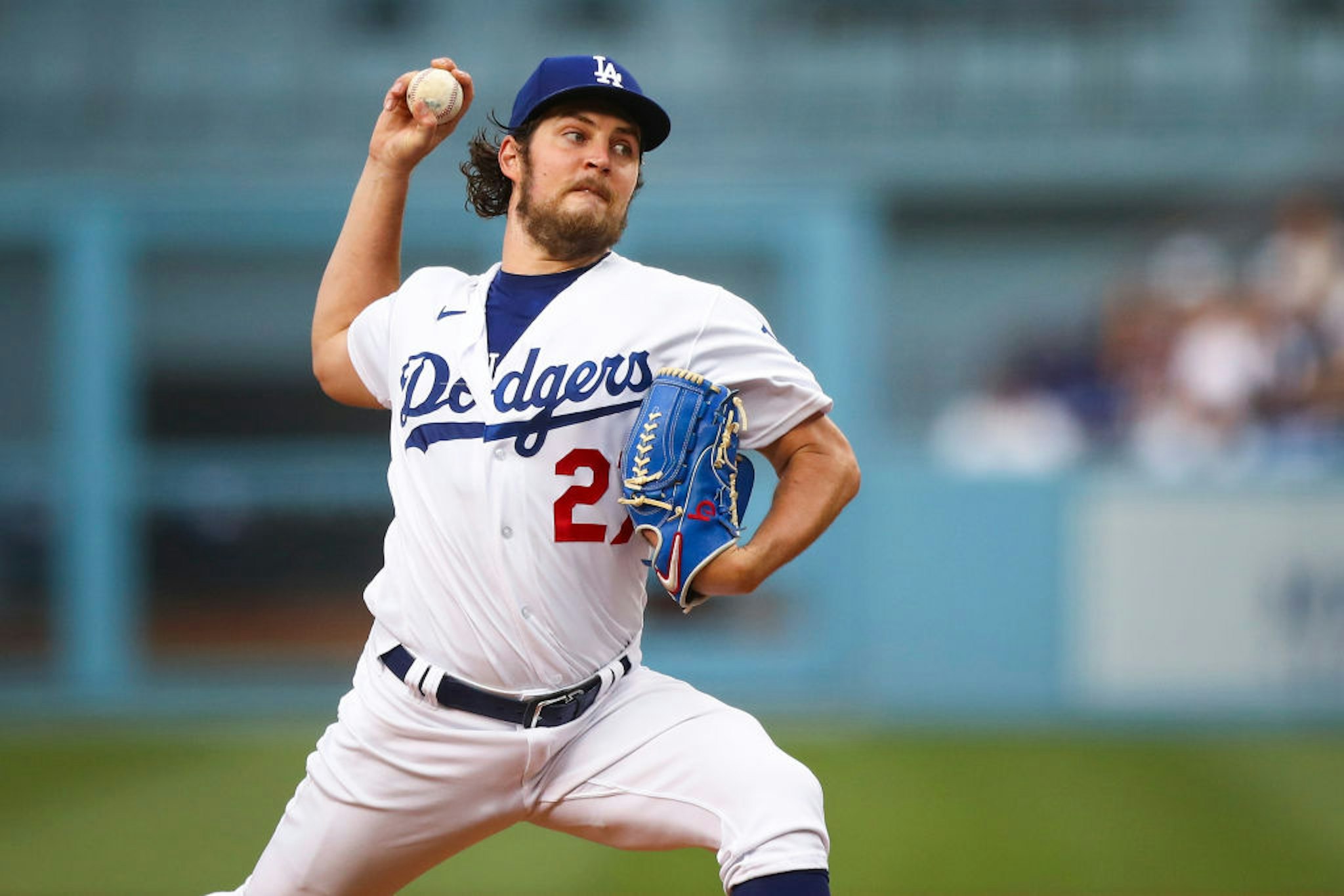 Trevor Bauer #27 of the Los Angeles Dodgers pitches in the first inning against the San Francisco Giants at Dodger Stadium on June 28, 2021 in Los Angeles, California.