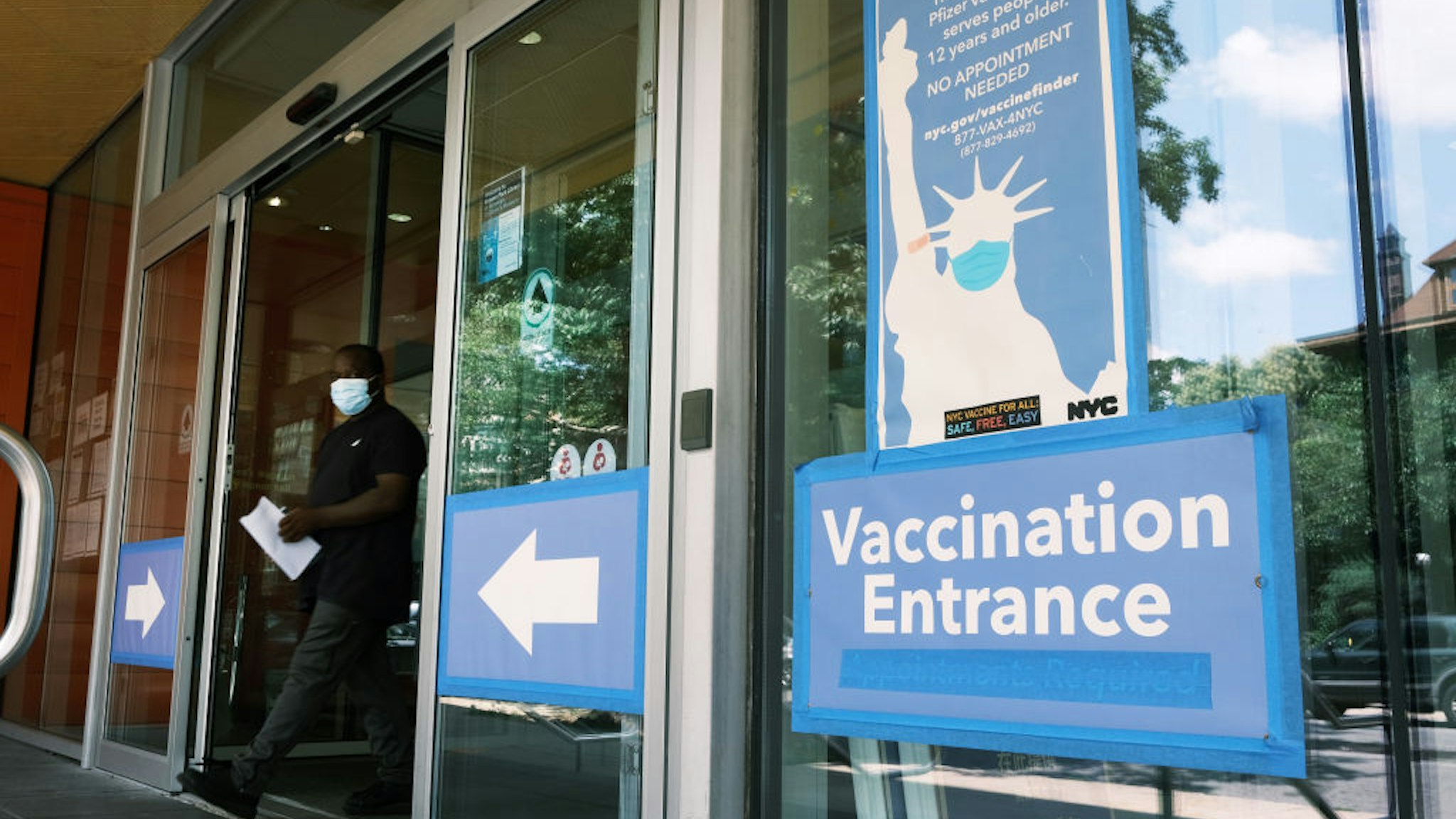 NEW YORK, NEW YORK - JULY 30: A city-operated mobile pharmacy advertises the COVID-19 vaccine in a Brooklyn neighborhood on July 30, 2021 in New York City. Due to the rapidly spreading Delta variant, New York City Mayor Bill de Blasio has announced that the city will require all city workers to be vaccinated or tested weekly for COVID-19 and the city will now pay any individual $100 to get the shot. (Photo by Spencer Platt/Getty Images)
