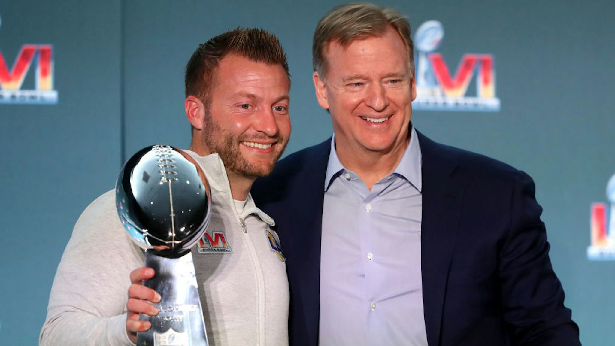 LOS ANGELES, CALIFORNIA - FEBRUARY 14: Head coach Sean McVay of the Los Angeles Rams and NFL Commissioner Roger Goodell pose with the Vince Lombardi Trophy during the Super Bowl LVI head coach and MVP press conference at Los Angeles Convention Center on February 14, 2022 in Los Angeles, California. (Photo by Katelyn Mulcahy/Getty Images)